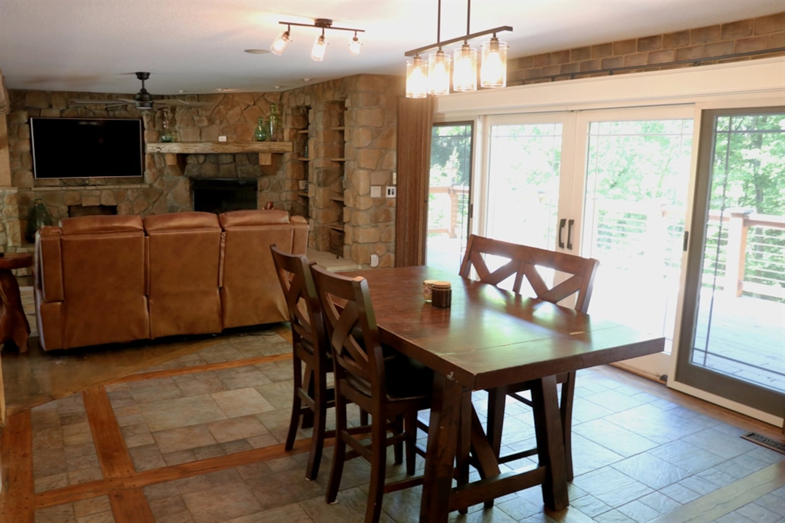 Bricks accent the wall above the patio doors and continue in the dining room. 