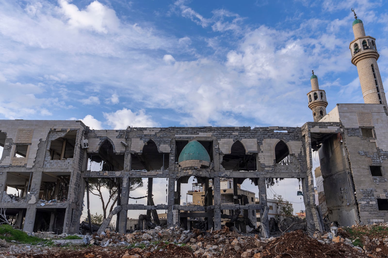 A destroyed mosque, caused by the Israeli air and ground offensive, is seen in the town of Khiam, southern Lebanon, Monday, Feb. 17, 2025. (AP Photo/Hassan Ammar)