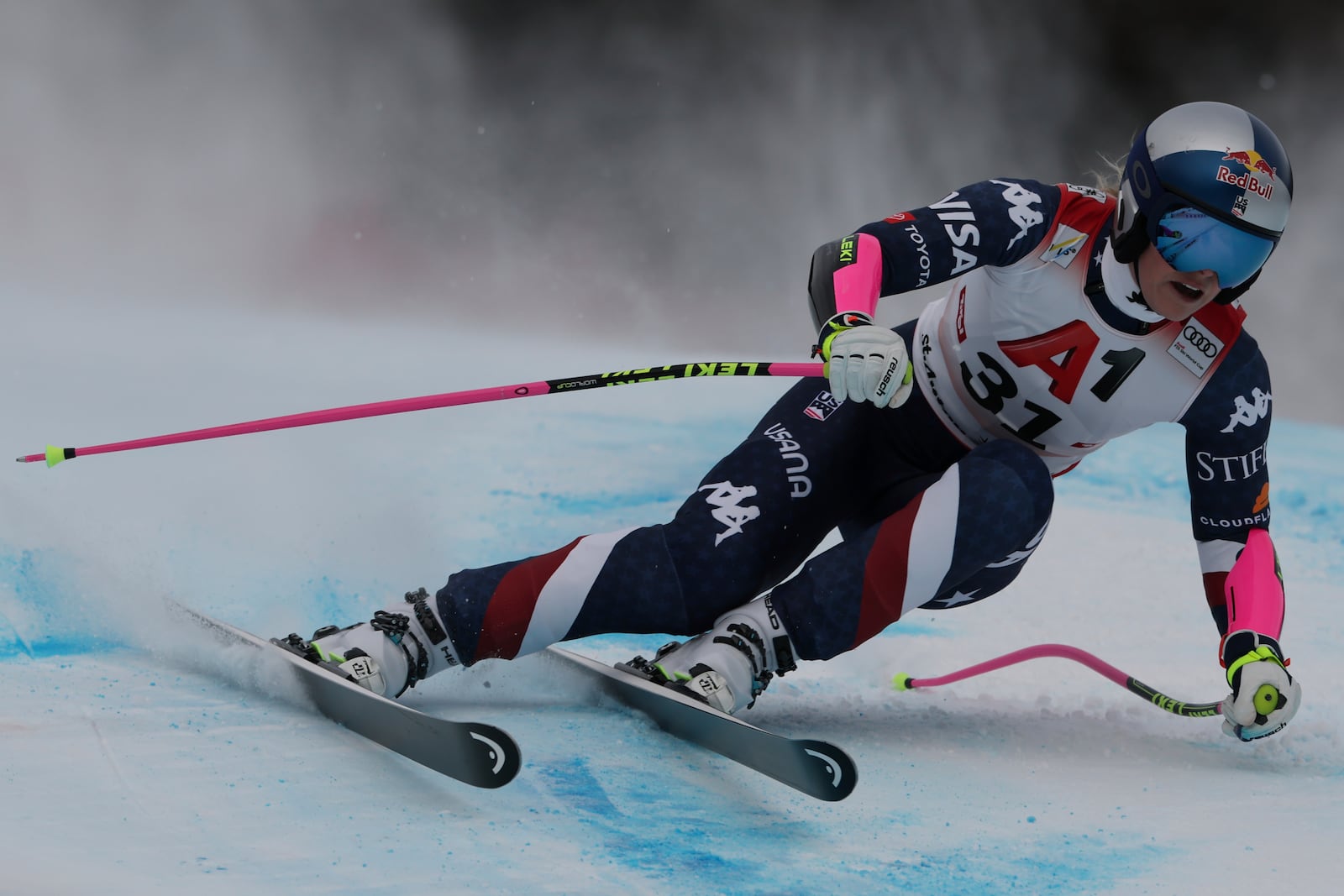 United States Lindsey Vonn speeds down the course during an alpine ski, women's World Cup super G race, in St. Anton, Austria, Sunday, Jan. 12, 2025. (AP Photo/Marco Trovati)