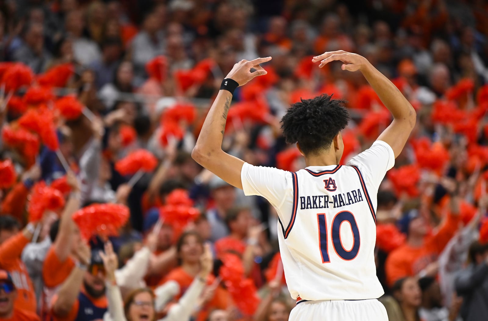 Auburn forward/guard Chad Baker-Mazara (10) celebrates a 3-pointer against Georgia during the first half an NCAA college basketball game Saturday, Feb. 22, 2025, in Auburn, Ala. (AP Photo/Julie Bennett)