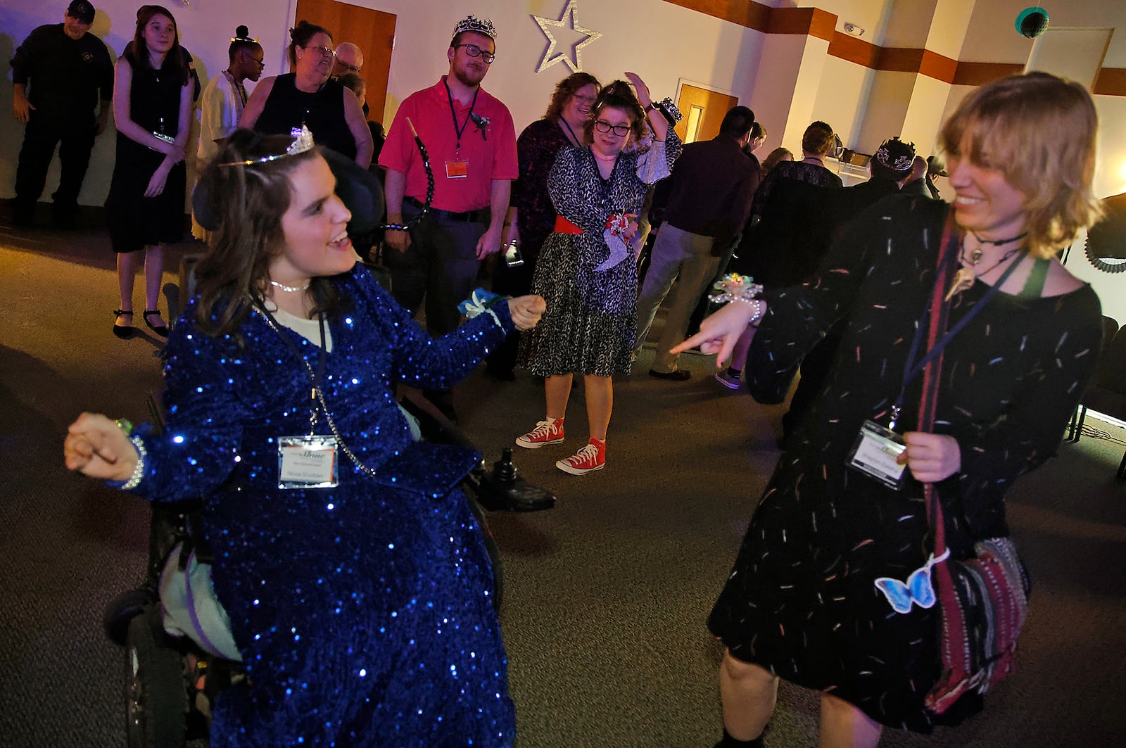 Nissa Scudder, left, dances with her friendduring the Night to Shine prom for individuals with special needs at the Lawrenceville Church of God Friday, Feb. 9, 2024. Night to Shine is for anyone over age 14 with special needs hosted by local churches around the world.