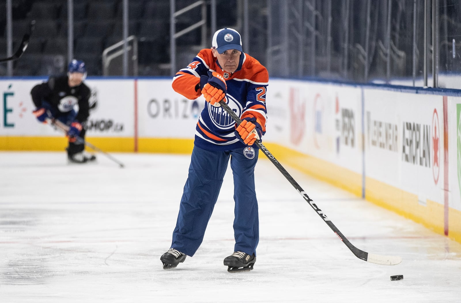 Canadian Prime Minister Mark Carney skates with the Edmonton Oilers NHL hockey team during a visit to Edmonton, Alberta, Thursday, March 20, 2025. (Jason Franson/The Canadian Press via AP)