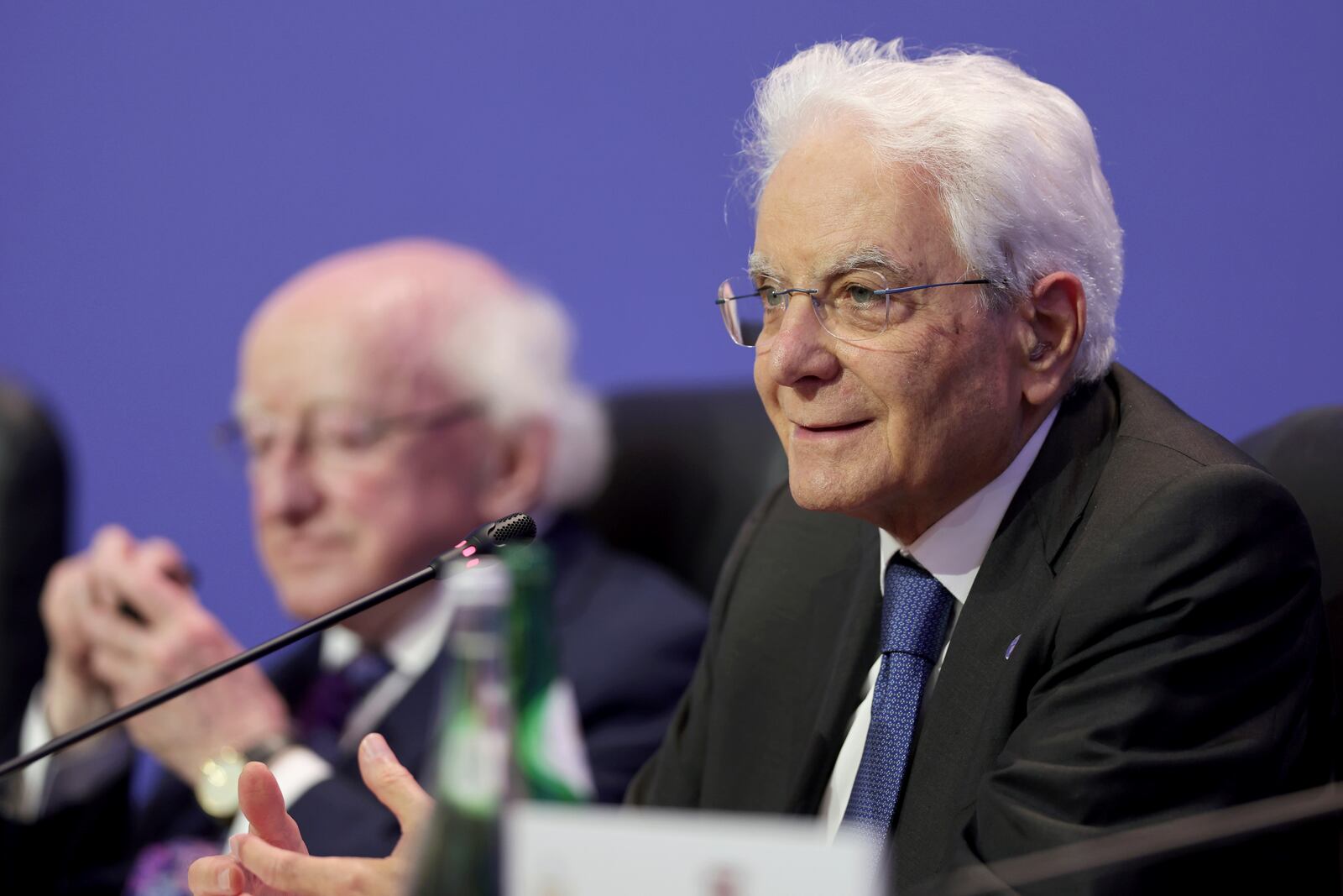 FILE - Sergio Mattarella, President of Italy, right, addresses journalists at the end of the Arraiolos Group meeting in Porto, Portugal, Oct. 6, 2023. (AP Photo/Miguel Angelo Pereira, File)