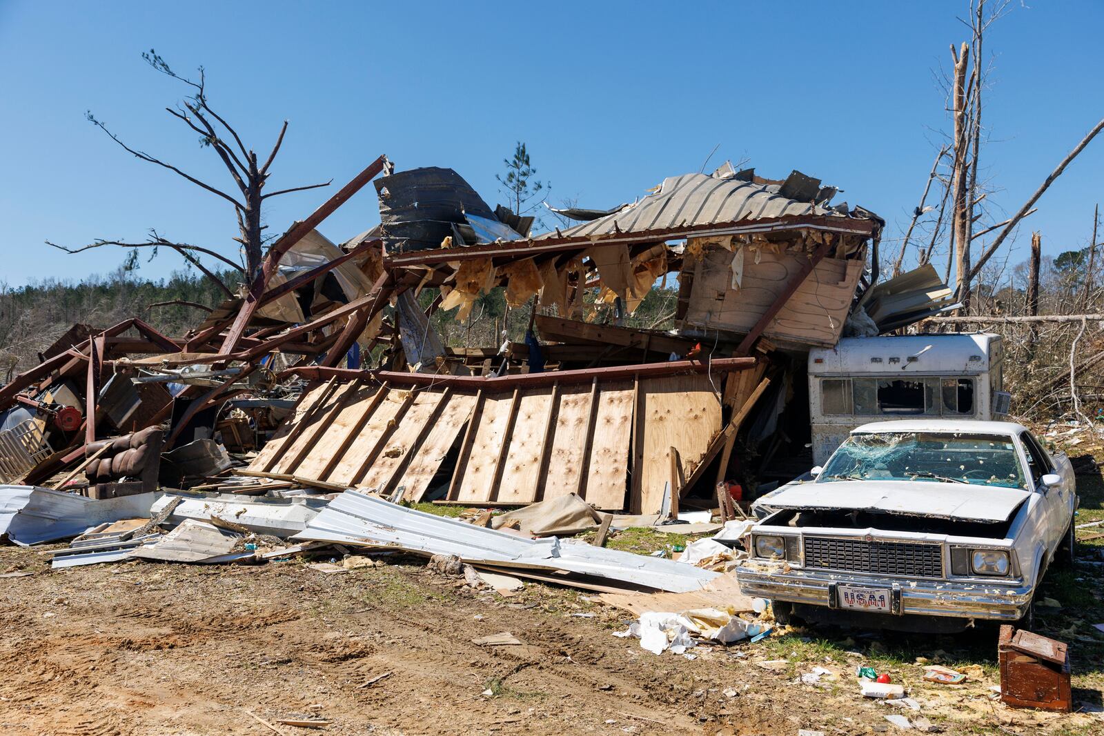 Well known community member Dunk Pickering perished at this warehouse site where he often hosted community members on Dallas County 63, Monday, March 17, 2025, in Plantersville, Ala, following deadly tornados that hit the area Saturday. (AP Photo/Vasha Hunt)