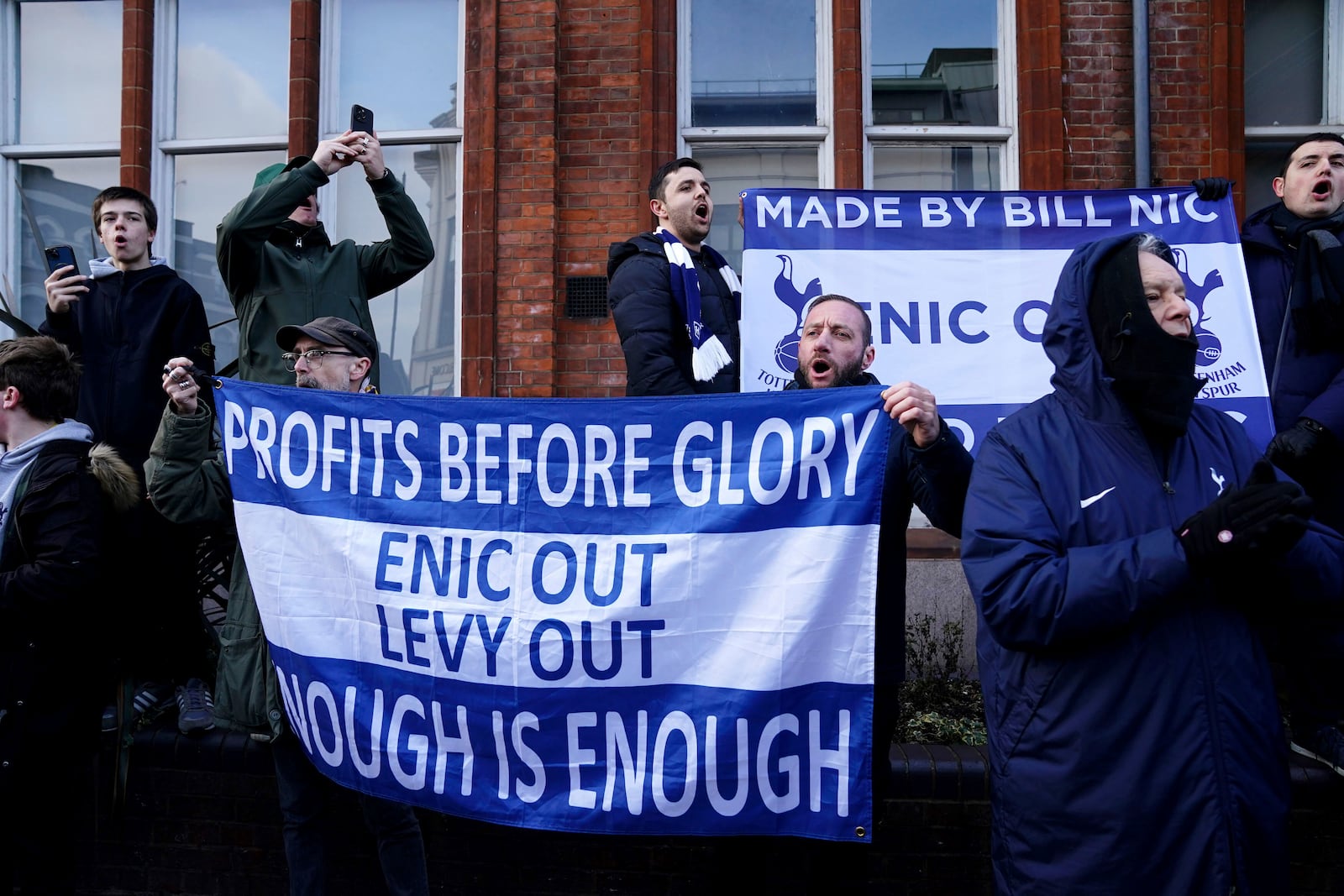 Tottenham Hotspur fans protest against the club owners ahead of the Premier League match between Tottenham and Manchester United at the Tottenham Hotspur Stadium, London, Sunday Feb. 16, 2025. (John Walton/PA via AP)