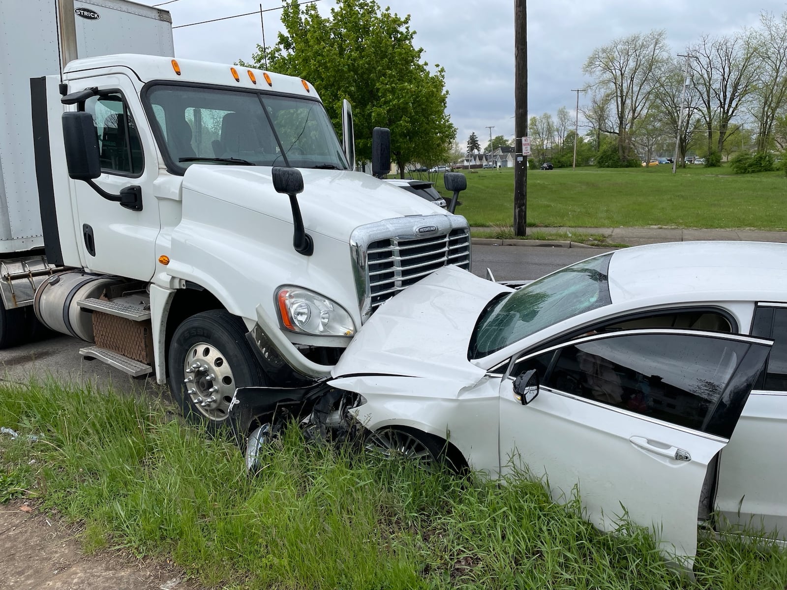 The driver of a Ford Fusion got out and ran after crashing head-on into a semi truck on Selma Road Tuesday, May 2, 2023. A second car wasn’t able to stop and crashed into the rear of the truck’s trailer. A female was transported from the scene by medic unit. BILL LACKEY/STAFF