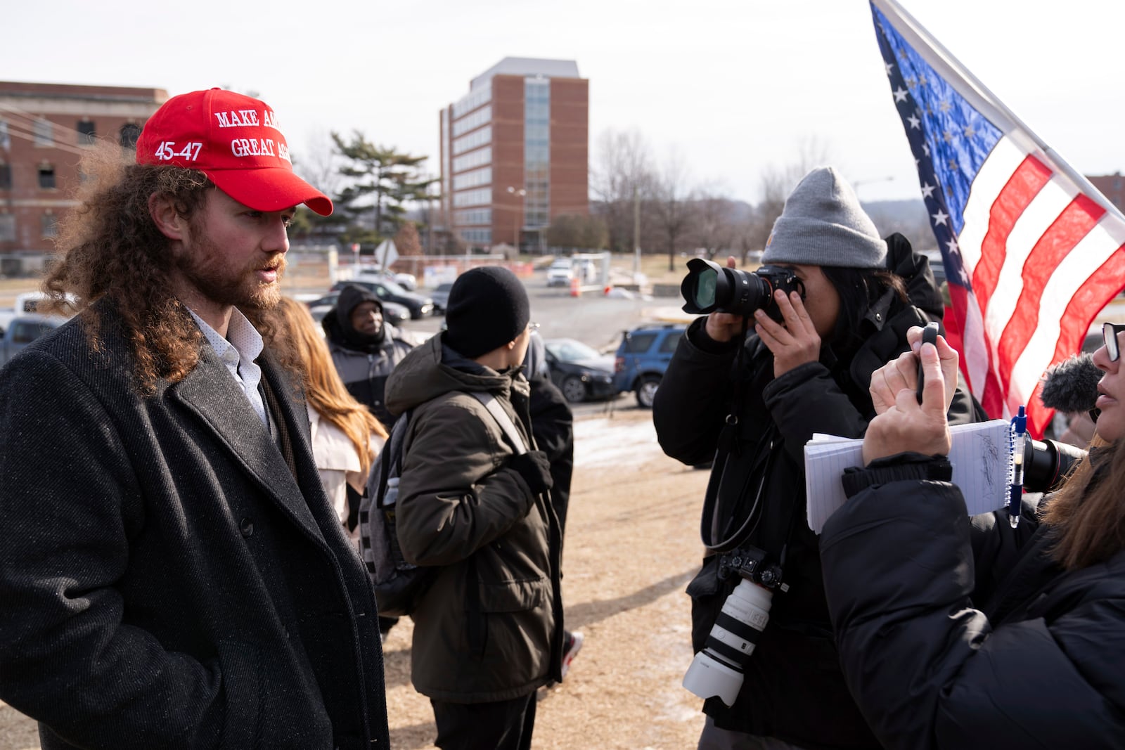 President Donald Trump supporter Robert Morss, who participated in the Jan. 6 riots in the U.S. Capitol, speaks to reporters after being released early morning from Pittsburgh Loretto prison and is outside of DC Central Detention Facility in solidarity for the other people there, Tuesday, Jan. 21, 2025, in Washington. Morse was release after 3 and a half years in prison. (AP Photo/Jose Luis Magana)