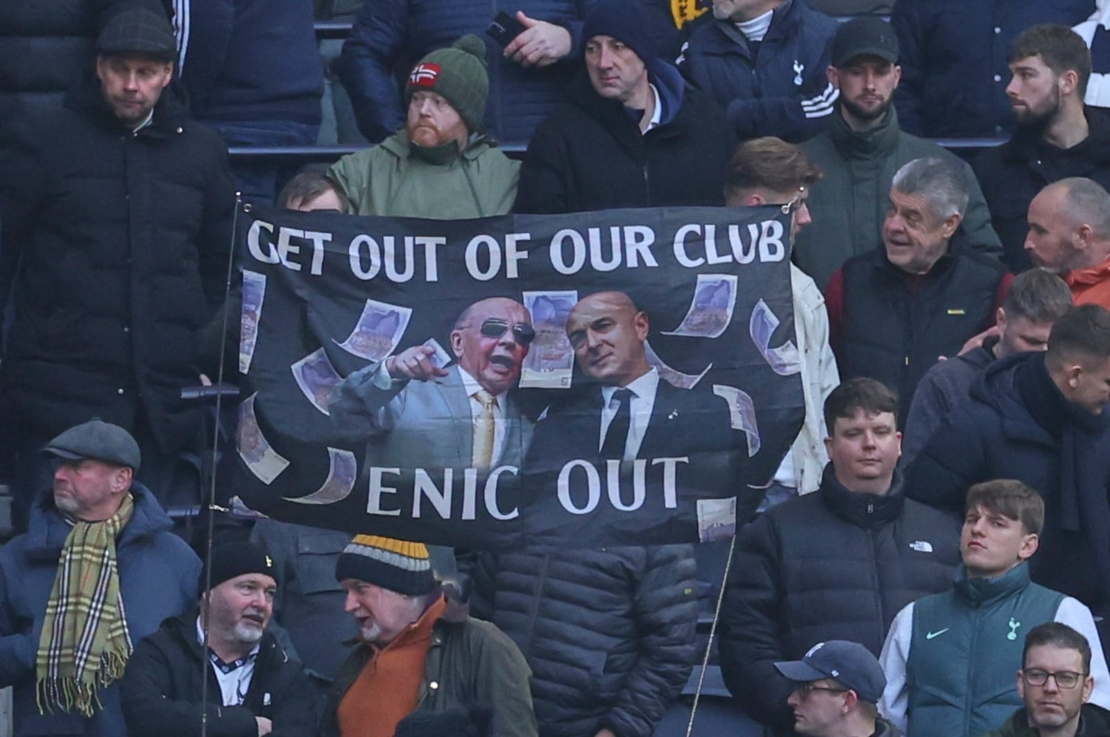 Tottenham supporters hold a protest against the club's owners during the English Premier League soccer match between Tottenham Hotspur and Manchester United in London, Sunday, Feb. 16, 2025. (AP Photo/Ian Walton)