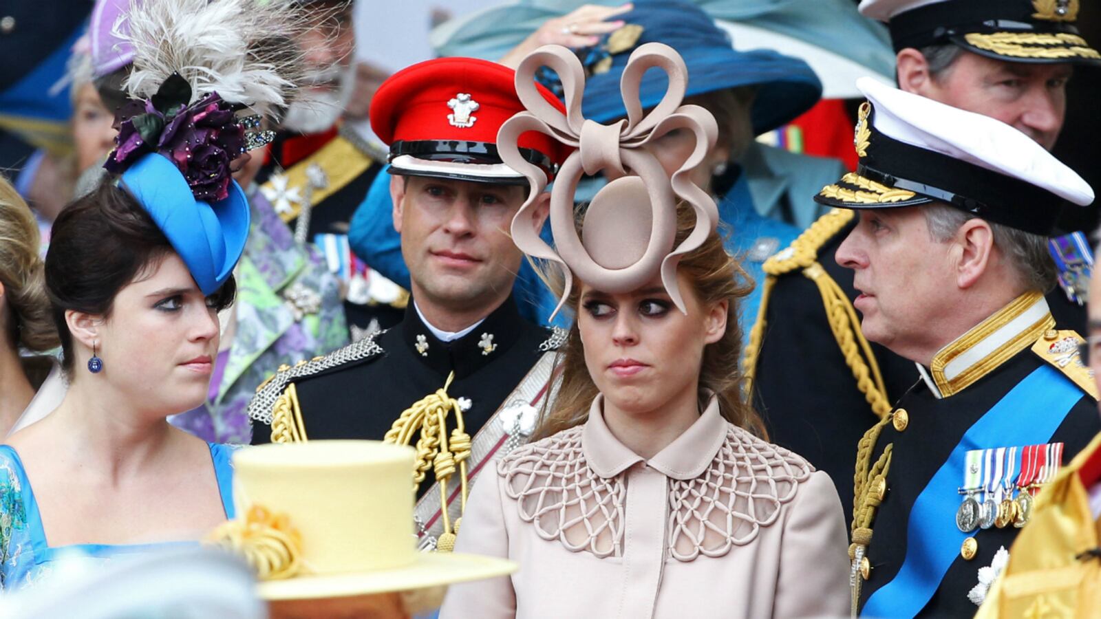 The hat that made the world gasp with horror. (L-R) Princess Eugenie of York, Prince Edward, Earl of Wessex, Princess Beatrice of York and Prince Andrew, Duke of York following the marriage of Prince William, Duke of Cambridge and Catherine, Duchess of Cambridge at Westminster Abbey on April 29, 2011 in London, England. Beatrice’s “fascinator,” which the British press uncharitably dubbed the “Squid Hat,” ended up being auctioned off for big charity bucks.