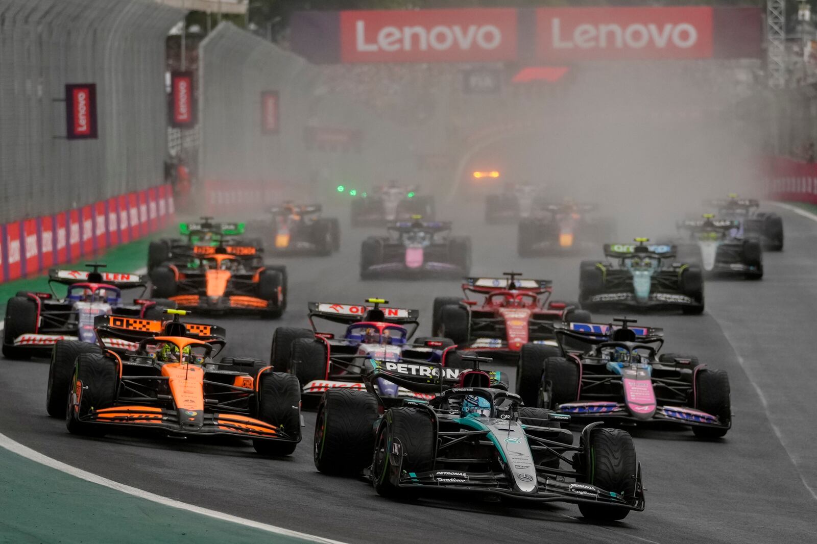 George Russell, of Britain, leads on his Mercedes after the start of the Brazilian Formula One Grand Prix at the Interlagos race track in Sao Paulo, Brazil, Sunday, Nov. 3, 2024. (AP Photo/Andre Penner)