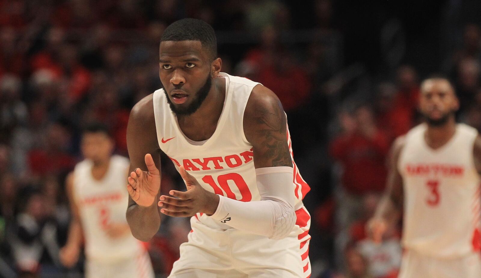 Dayton’s Jalen Crutcher claps during a game against Virginia Commonwealth on Tuesday, Jan. 14, 2020, at UD Arena.