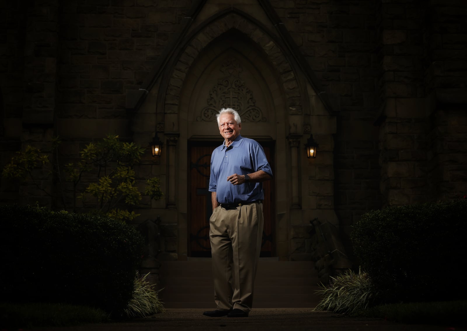 Fr. John Civille stands outside Holy Trinity Church Wednesday, Sept. 22, 2021on Clark Street in Middletown where he has been a pastor for nearly 30 years as part of the Holy Family Parish. NICK GRAHAM / STAFF