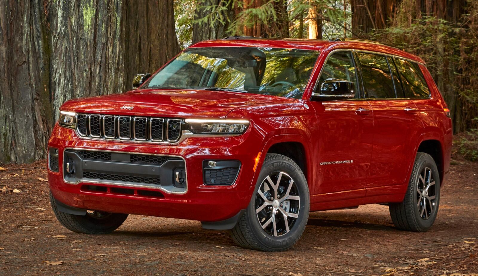 This photo provided by Fiat Chrysler Automobiles shows the 2021 Jeep Grand Cherokee L, a midsize SUV that will feature the new Uconnect 5 infotainment system. (FCA US via AP)