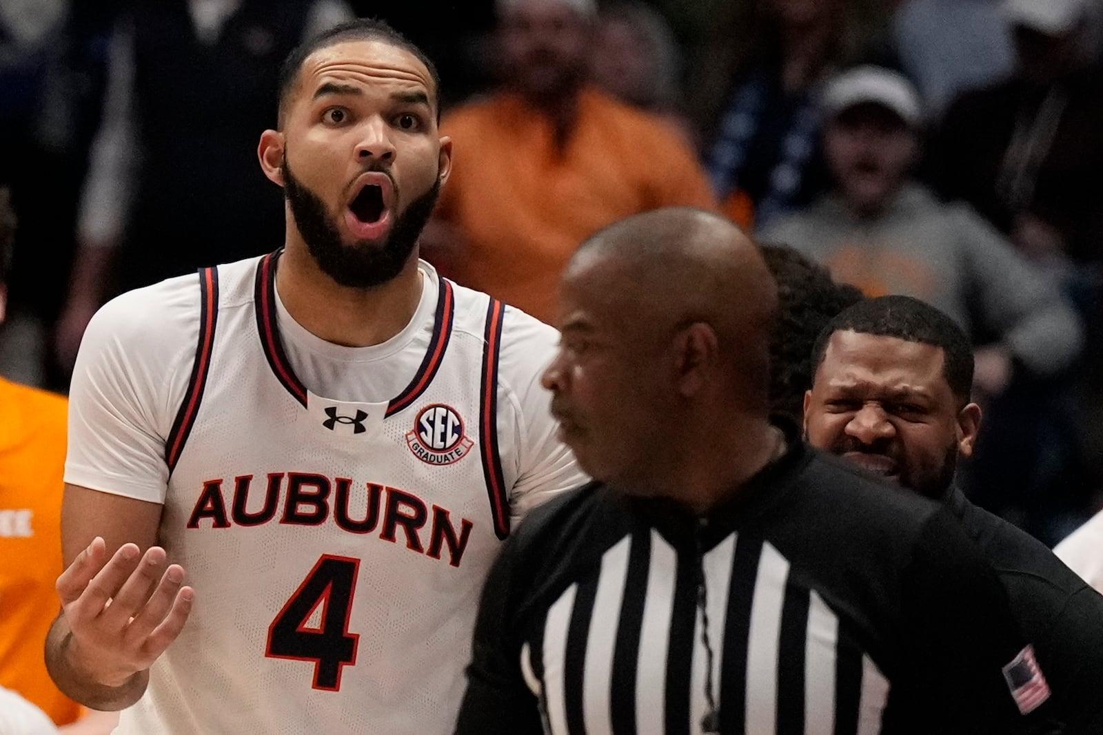 Auburn forward Johni Broome (4) reacts to play against Tennessee during the first half of an NCAA college basketball game in the semifinal round of the Southeastern Conference tournament, Saturday, March 15, 2025, in Nashville, Tenn. (AP Photo/George Walker IV)