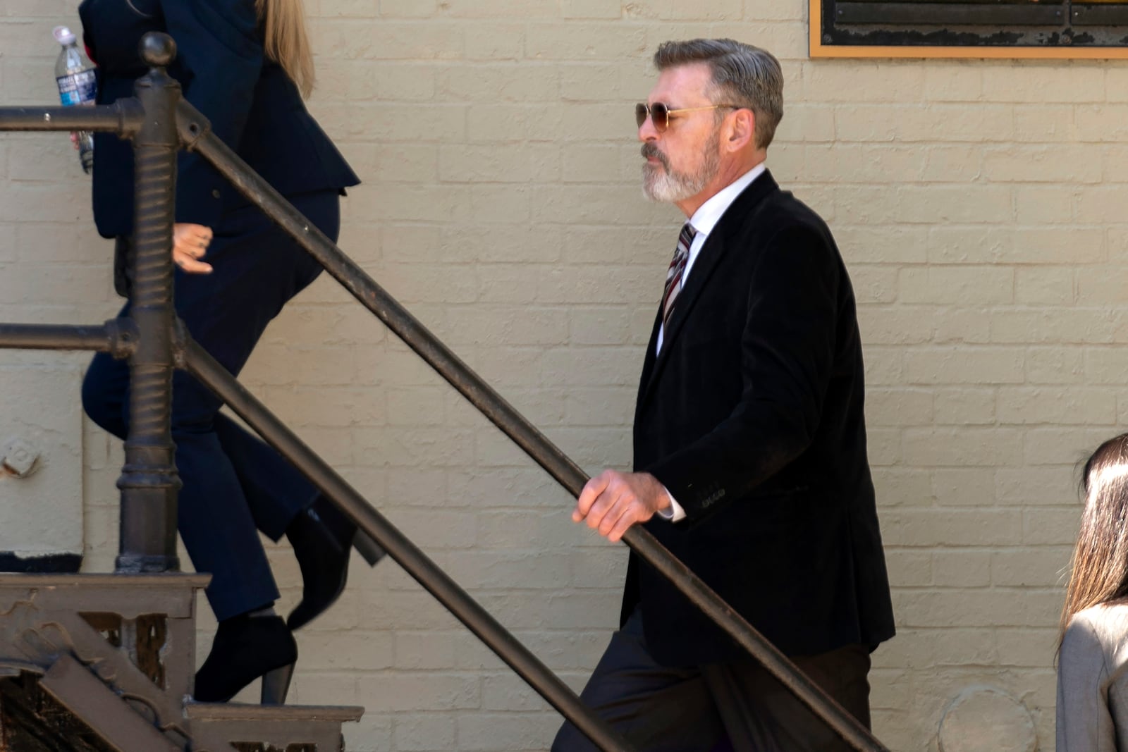 Actor Jay Johnston walks into a building after leaving federal court Monday, Oct. 28, 2024, after he was sentenced to a one year and one day in prison for taking part in the riot at the U.S. Capitol nearly four years ago. (AP Photo/Jose Luis Magana)