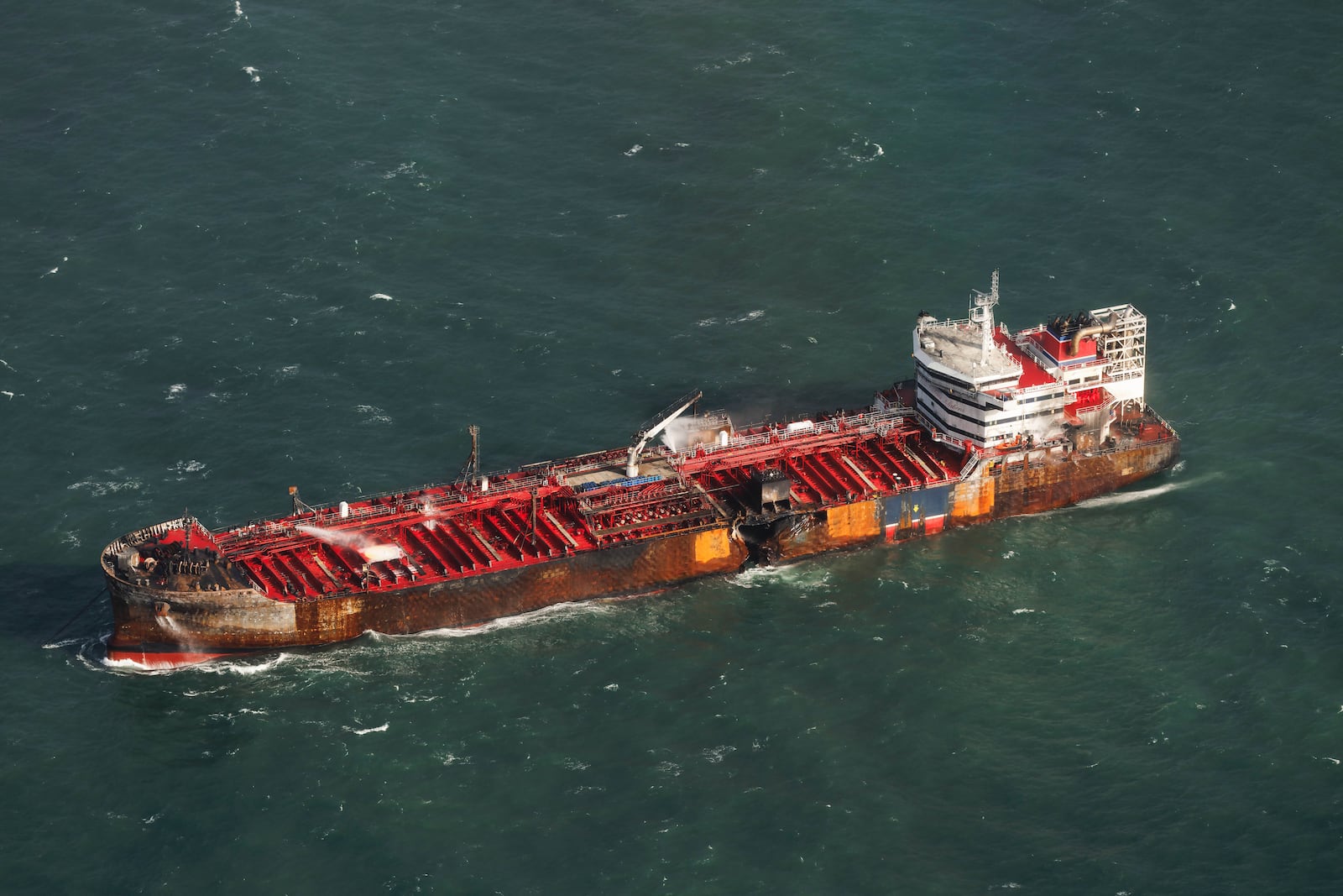 The damaged MV Stena Immaculate tanker is seen at anchor off the Yorkshire coast in the North Sea near Grimsby, England, Tuesday, March 11, 2025 in England. (Dan Kitwood/Pool Photo via AP)