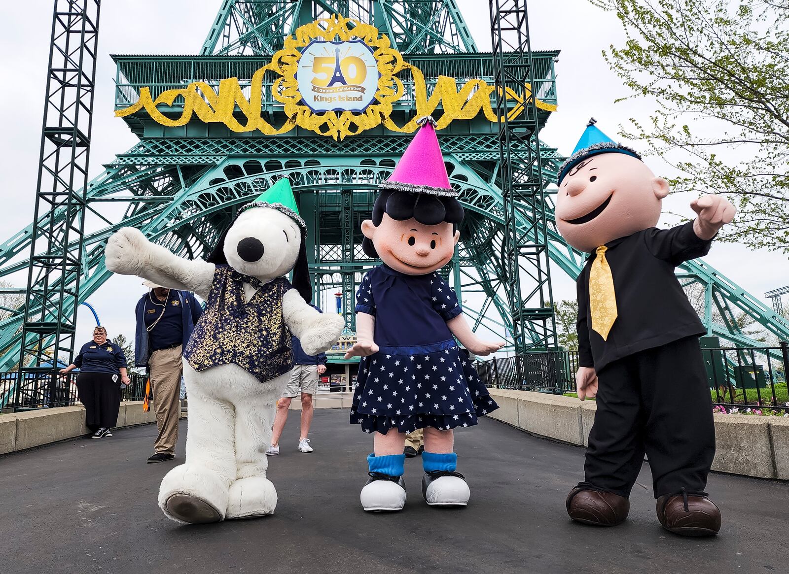 Peanuts characters dance as Kings Island held an opening ceremony and ribbon cutting Friday, April 29, 2022 in celebration of their 50th Anniversary. NICK GRAHAM/STAFF