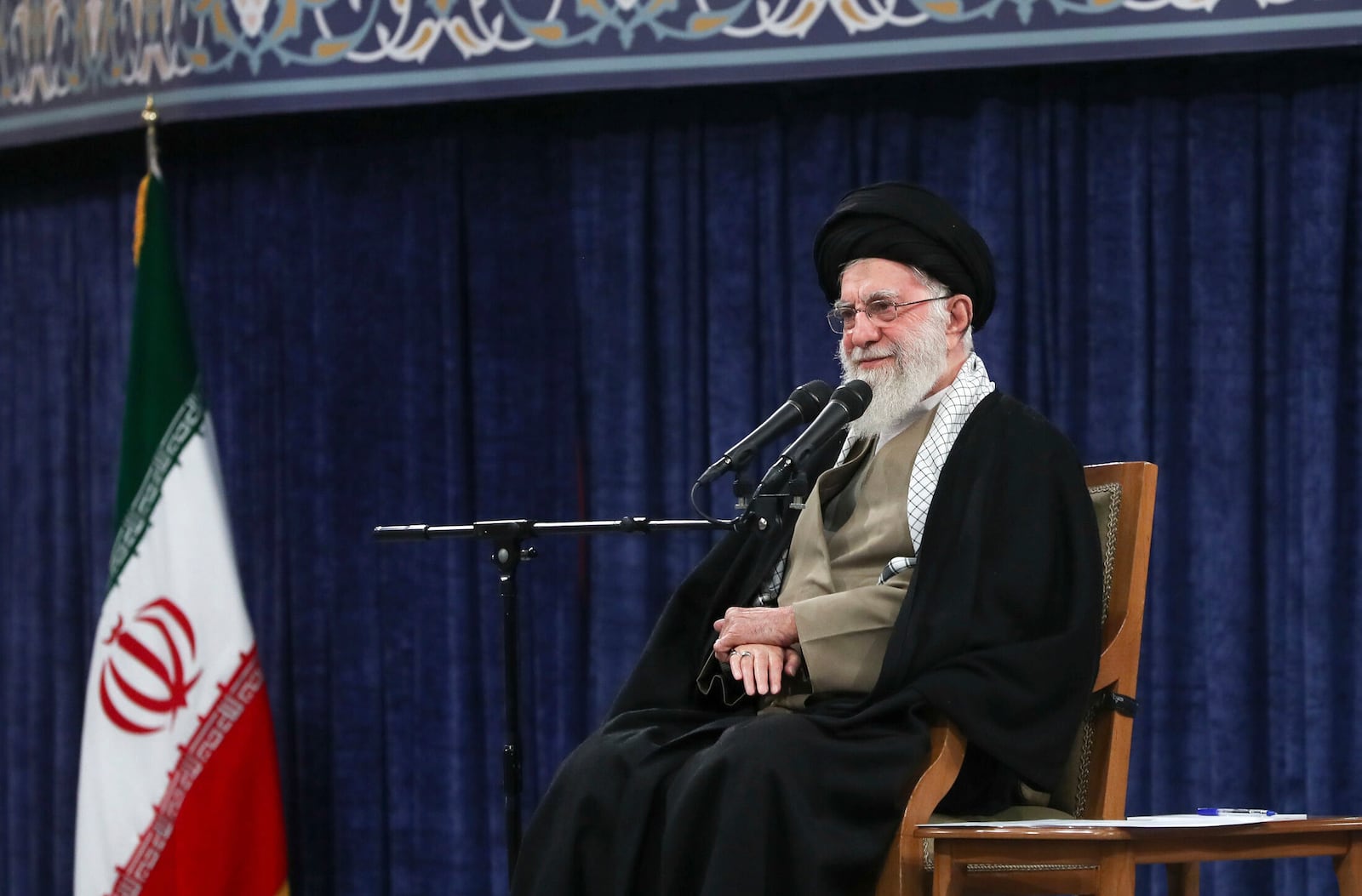 In this photo released by the official website of the office of the Iranian supreme leader, Supreme Leader Ayatollah Ali Khamenei listens to a speaker during a meeting with students, in Tehran, Iran, Wednesday, March 12, 2025. (Office of the Iranian Supreme Leader via AP)