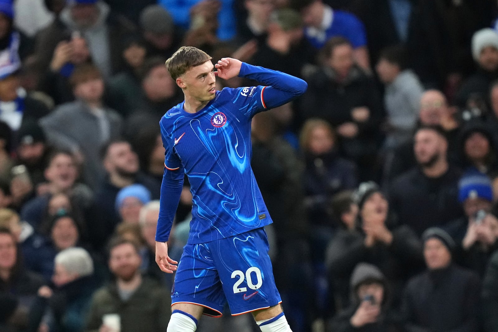 Chelsea's Cole Palmer celebrates after scoring the opening goal during the English Premier League soccer match between Chelsea and Fulham at Stamford Bridge stadium in London, Thursday, Dec. 26, 2024. (AP Photo/Kirsty Wigglesworth)