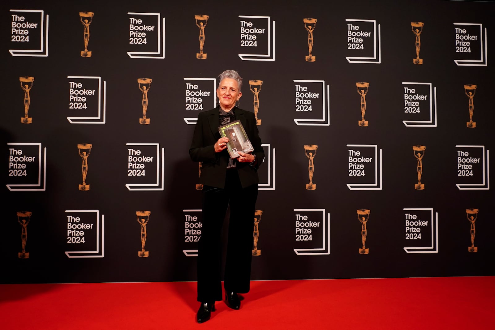 Charlotte Wood arrives at the Booker Prize award dinner in London, Tuesday, Nov. 12, 2024. (AP Photo/Alberto Pezzali)