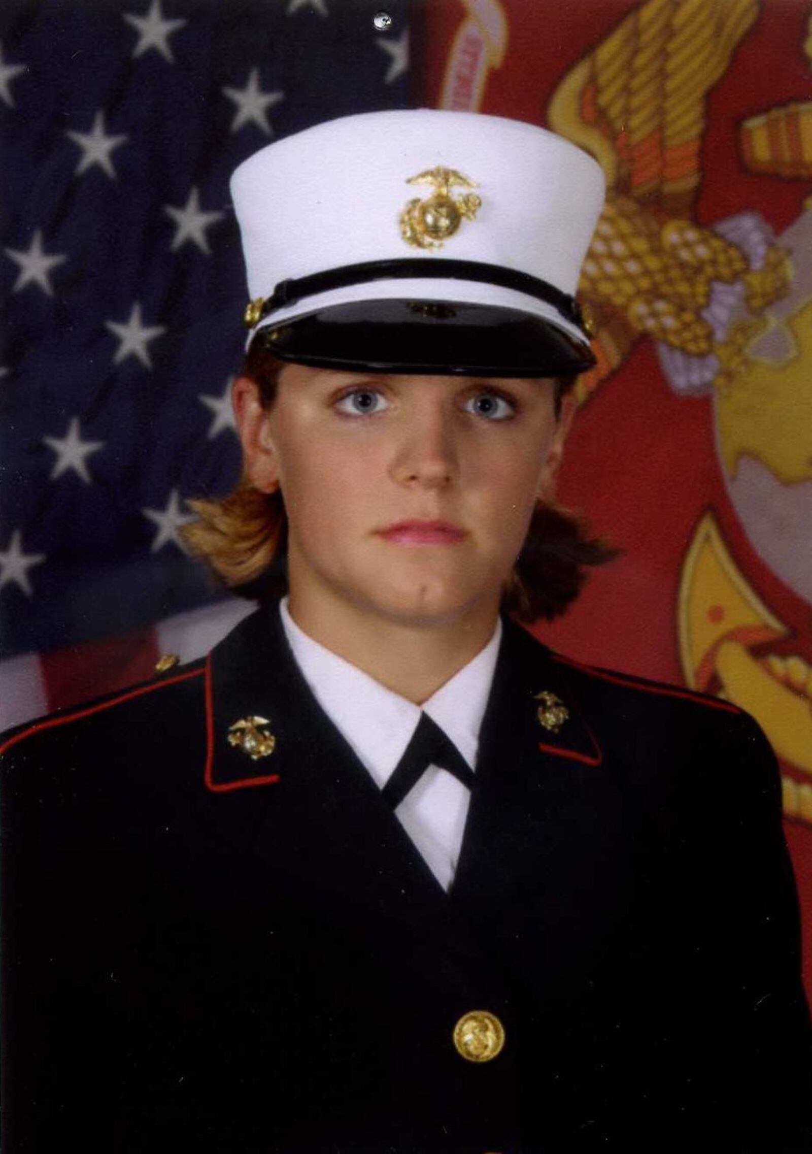 Marine Lance Cpl. Maria Lauterbach is pictured here. Lauterbach was eight months pregnant when she disappeared in December 2007. Her burned remains, and those of her unborn child, were found a month later. Lauterbach's mother, Mary Lauterbach of Vandalia, said the new law would have made the difference in the case of her daughter, who was denied a base transfer after accusing fellow Marine Cesar Laurean of sexual assault.