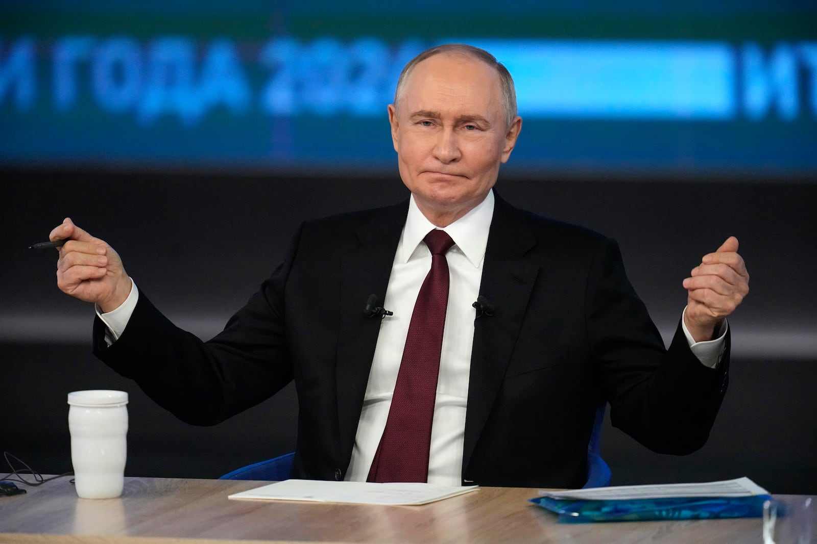 Russian President Vladimir Putin gestures while speaking during his annual news conference and call-in show at Gostinny Dvor in Moscow, Russia, Thursday, Dec. 19, 2024. (AP Photo/Alexander Zemlianichenko)