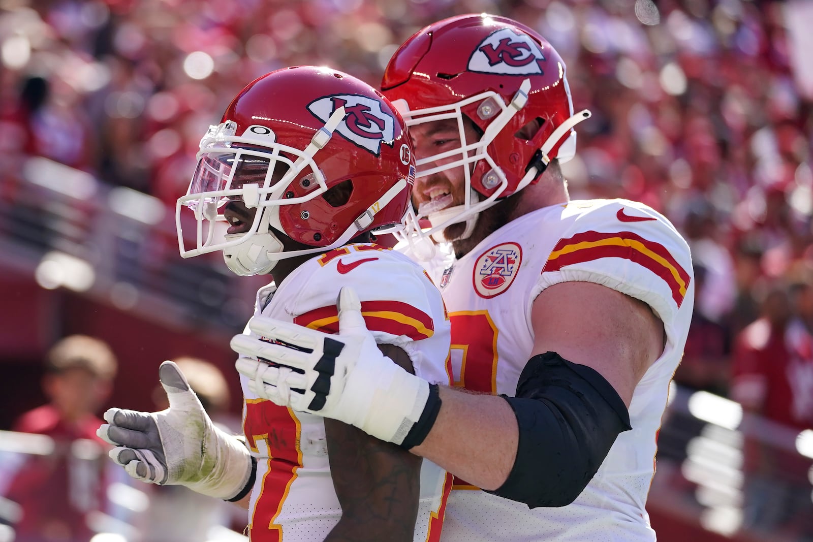 Kansas City Chiefs wide receiver Mecole Hardman, left, celebrates after scoring a touchdown with guard Joe Thuney during the first half of an NFL football game against the San Francisco 49ers in Santa Clara, Calif., Sunday, Oct. 23, 2022. (AP Photo/Godofredo A. Vásquez)