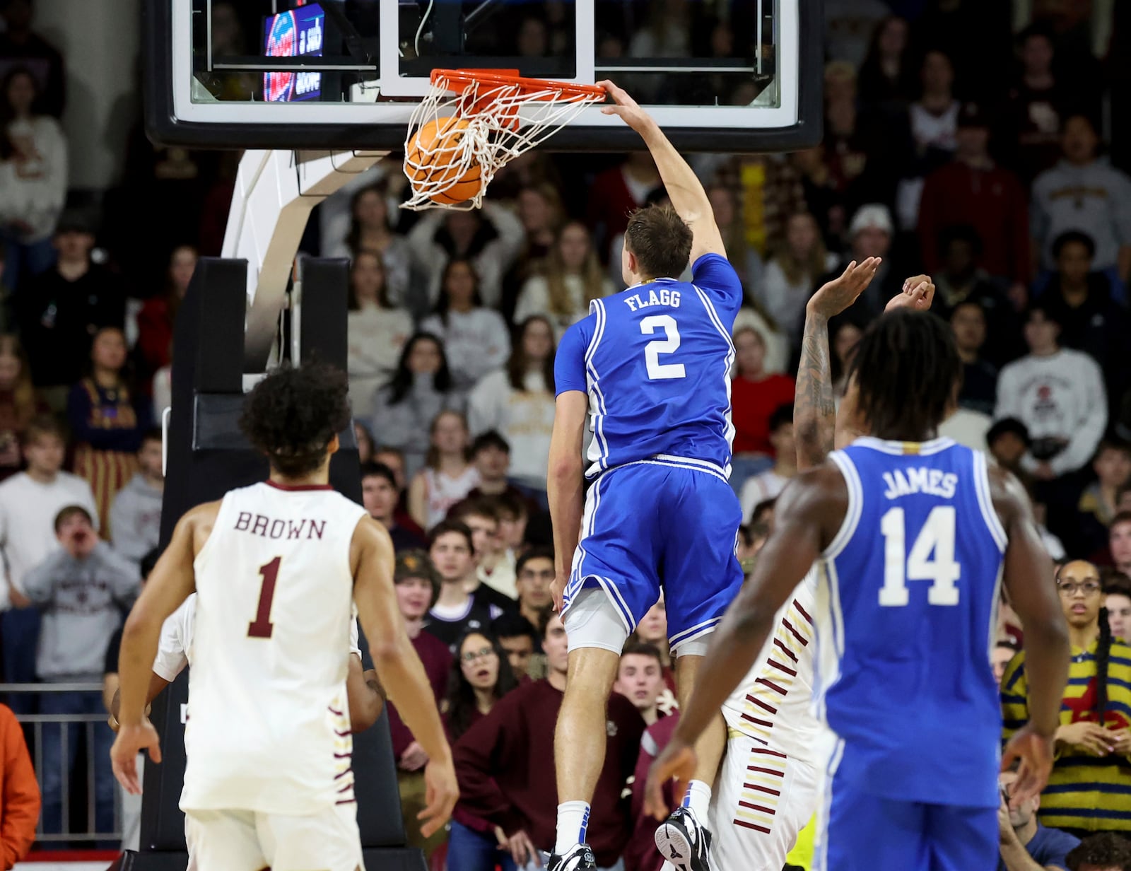 Duke guard Cooper Flagg (2) dunks the ball during the second half of an NCAA college basketball game against Boston Collge, Saturday, Jan. 18, 2025, in Boston. (AP Photo/Mark Stockwell)