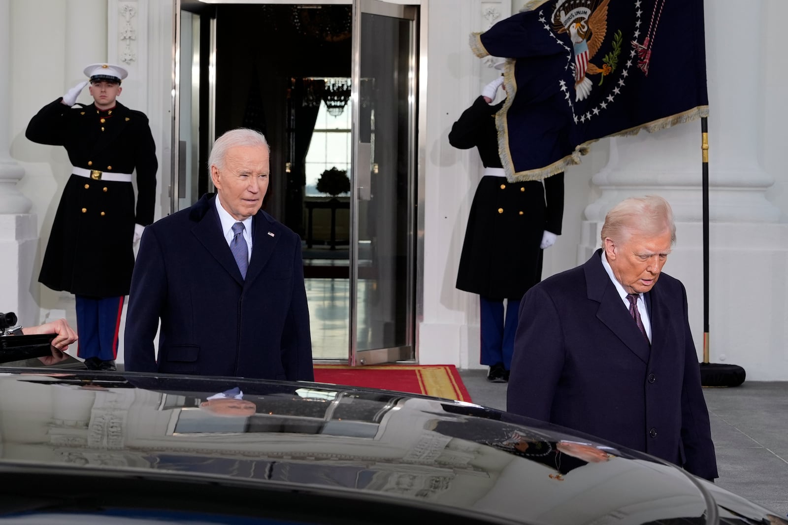 President Joe Biden and President-elect Donald Trump walk out to the presidential limousine, as they depart the White House, Monday, Jan. 20, 2025, in Washington, enroute to the Capitol. (AP Photo/Alex Brandon)