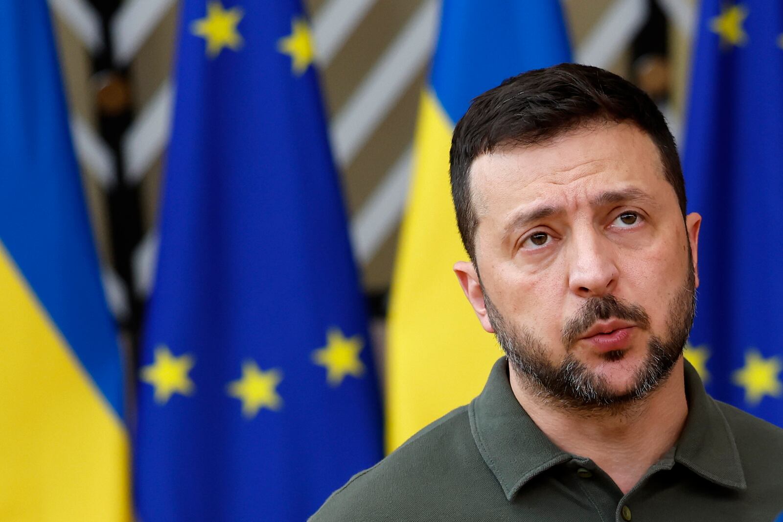 FILE -Ukraine's President Volodymyr Zelenskyy speaks with the media as he arrives for an EU summit in Brussels, Thursday, June 27, 2024. (AP Photo/Geert Vanden Wijngaert, File)