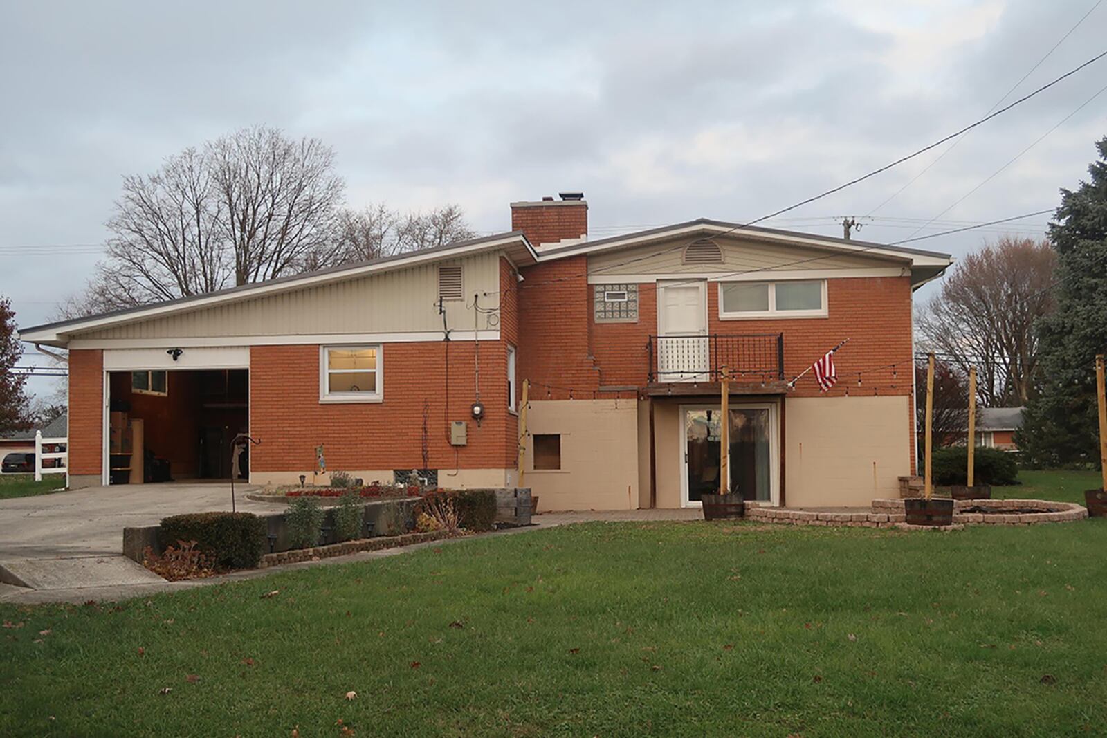 The home is set on about 1.12 acres and includes both a detached, 2-car garage and an attached, 2-car garage in back. The back yard has a newer paver patio with a connected brick firepit. CONTRIBUTED PHOTO