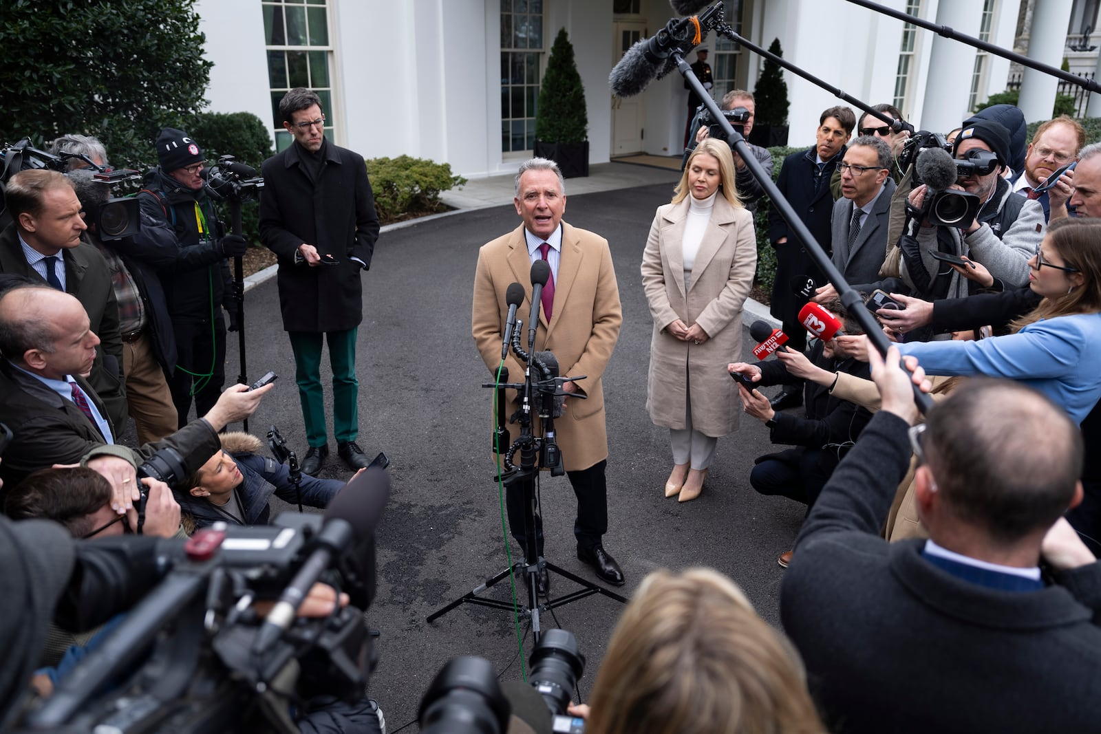 FILE - Steve Witkoff, White House special envoy, center, accompanied by White House press secretary Karoline Leavitt, speaks with reporters at the White House in Washington, March 6, 2025. (AP Photo/Ben Curtis, File)