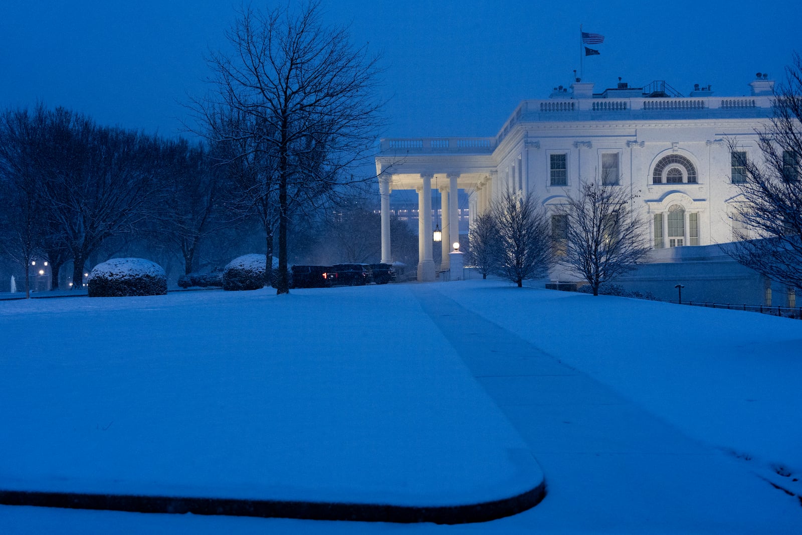 The White House is seen as the snow falls, Tuesday, Feb. 11, 2025, in Washington. (Photo/Alex Brandon)