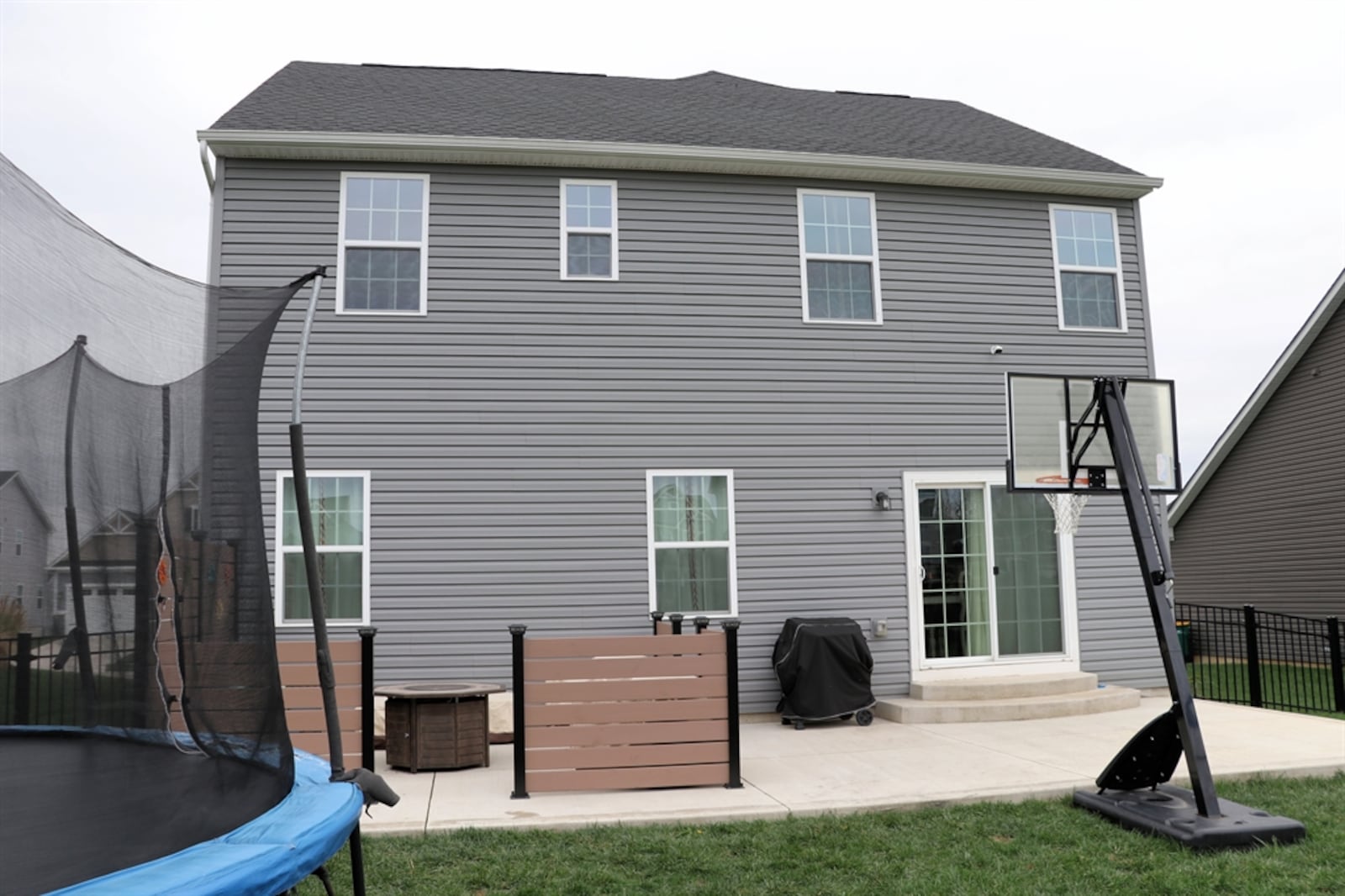 Built in 2021 within the River Reserve neighborhood of Beavercreek Twp., this vinyl-sided home at 2806 River Oaks Court has about 2,458 square feet of living space with an open main level, flex-space front room, and a finished basement with an egress window. CONTRIBUTED