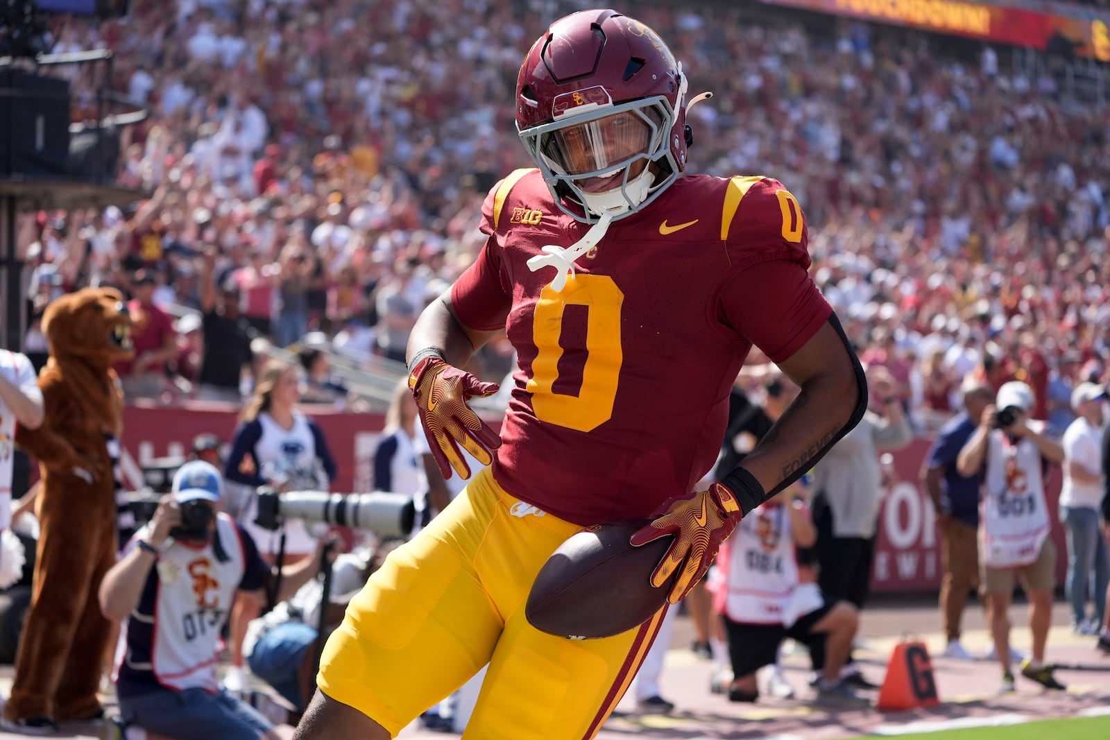 Southern California running back Quinten Joyner (0) celebrate after scoring a touchdown during the first half of an NCAA college football game against Penn State, Saturday, Oct. 12, 2024, in Los Angeles. (AP Photo/Marcio Jose Sanchez)