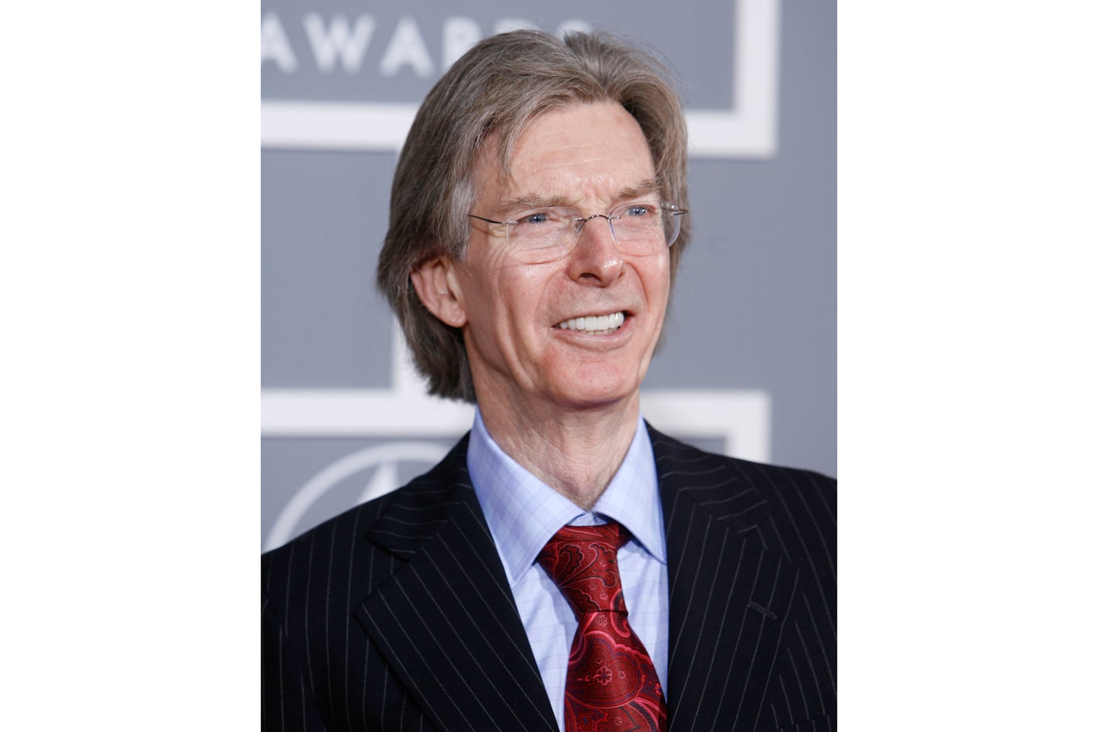 FILE - Phil Lesh of the Grateful Dead arrives for the 49th Annual Grammy Awards on Sunday, Feb. 11, 2007, in Los Angeles. Lesh, a founding member of the Grateful Dead, died Friday, Oct. 25, 2024, at age 84. (AP Photo/Matt Sayles, File)