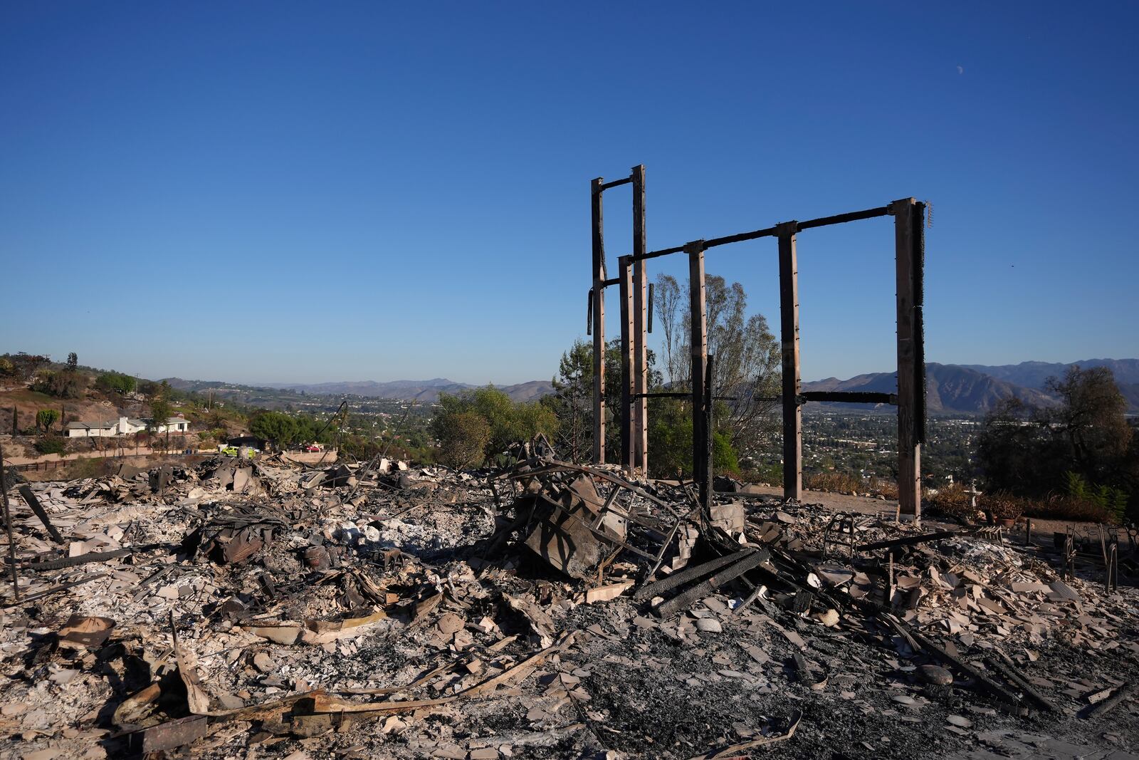 Partial remains of a home destroyed by the Mountain Fire remains standing in Camarillo, Calif., Friday, Nov. 8, 2024. (AP Photo/Jae C. Hong)