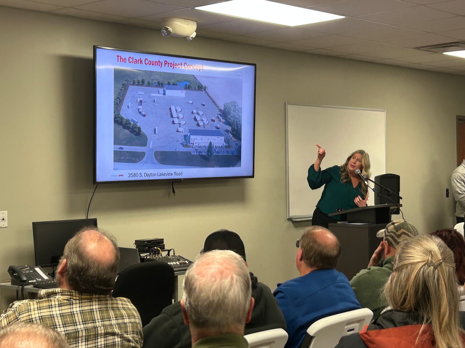 Rumpke senior vice president of communications Amanda Pratt presents the company's proposal for a waste transfer facility in Bethel Twp. at a public meeting Tuesday, Nov. 17, 2024. JESSICA OROZCO/STAFF