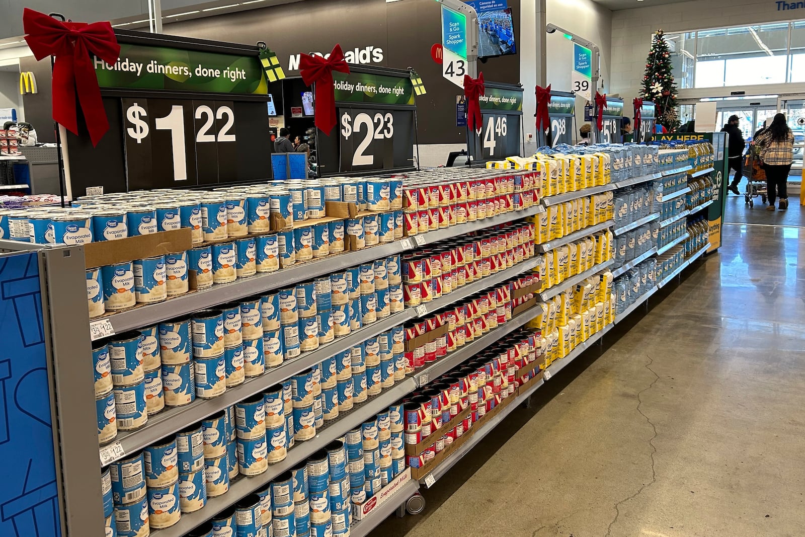 Items to include in holiday dinners are displayed at a Walmart store in Secaucus, N.J., on Wednesday, Nov. 13, 2024. (AP Photo/Anne D'Innocenzio)