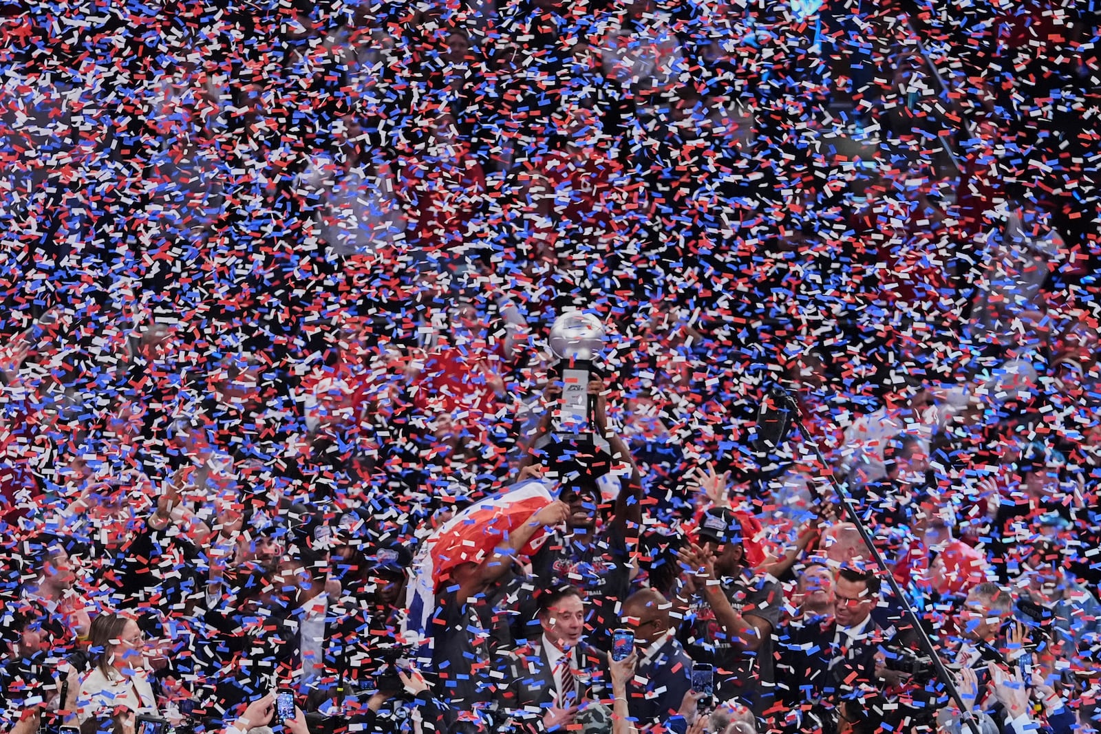 St. John's head coach Rick Pitino celebrates with his team after the tournament trophy was presented after an NCAA college basketball game against Creighton in the championship of the Big East Conference tournament Saturday, March 15, 2025, in New York. (AP Photo/Frank Franklin II)