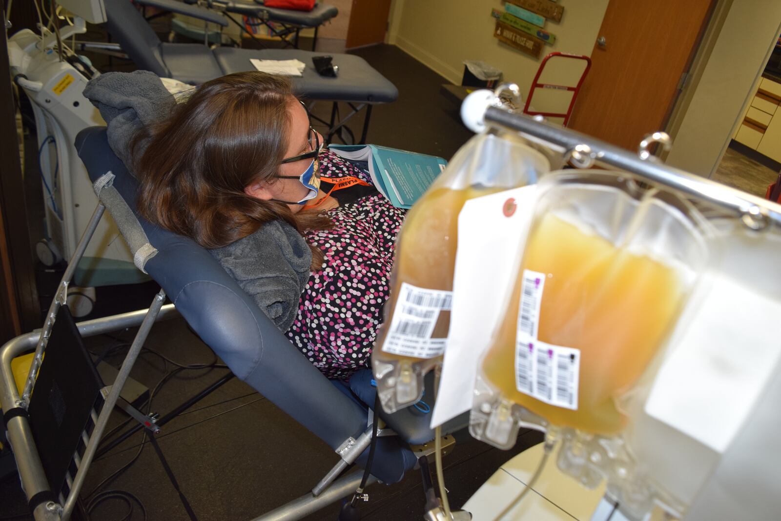 Rebecca Whited relaxes as she donates COVID-19 Convalescent Plasma at the Dayton-based Community Blood Center. CONTRIBUTED