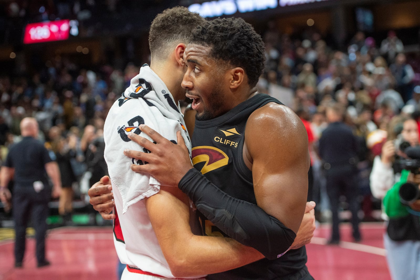 Cleveland Cavaliers' Donovan Mitchell, right talks with Chicago Bulls' Zach LaVine, left, after an Emirates NBA cup basketball game in Cleveland, Friday, Nov 15, 2024. (AP Photo/Phil Long)