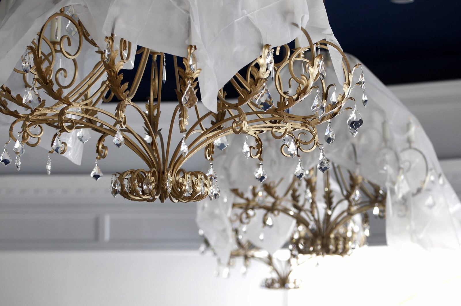 Eleven gold chandeliers hang from a twilight blue ceiling in the Eichelberger Pavilion in the new $10 million Winsupply Center of Leadership at Carillon Historical Park. The pavilion will be able to seat up to 700 people. LISA POWELL / STAFF