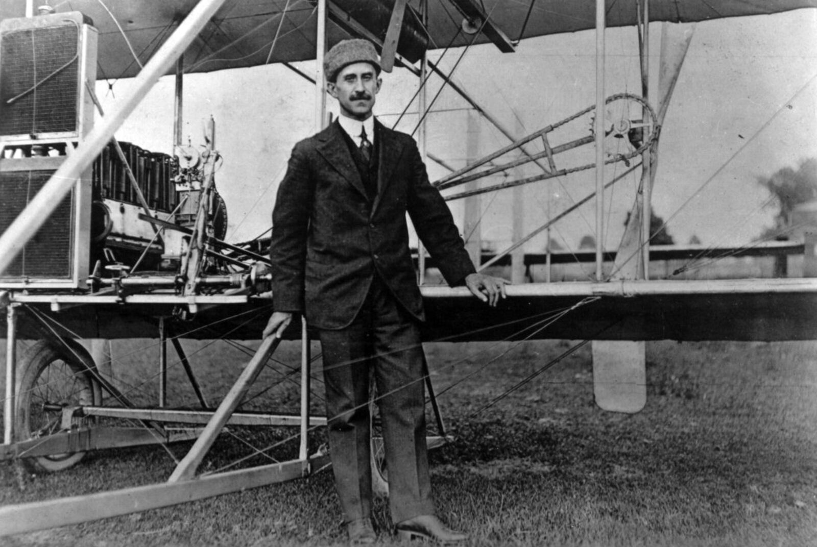 Orville Wright poses in front of a 1912 model C machine at Simms Station. This was one of the first 5 machines ordered by the Army.