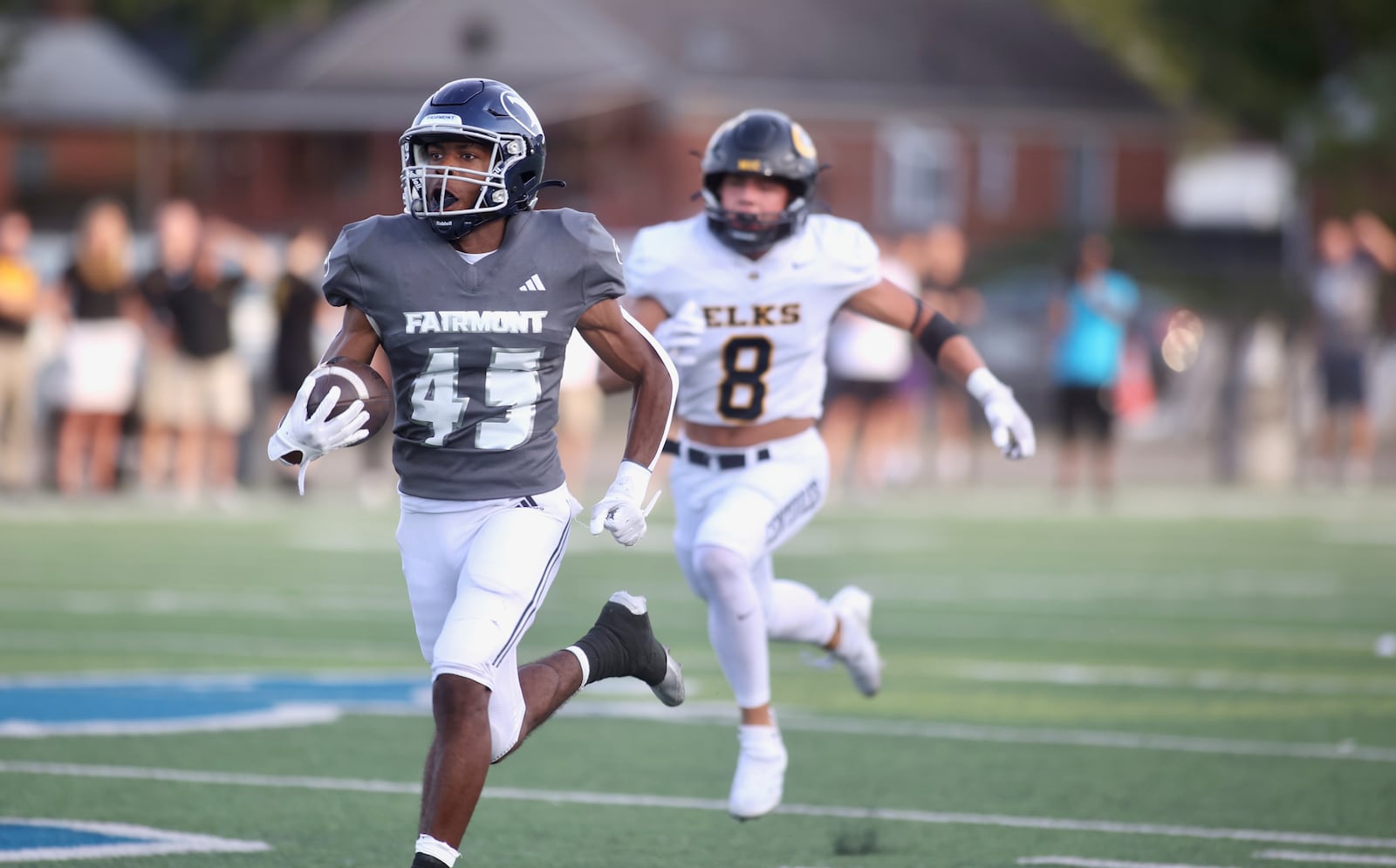 Fairmont's Cameron Thornton runs for a touchdown after a catch against Centerville on the first play of the game on Friday, Sept. 13, 2024, at Roush Stadium. David Jablonski/Staff