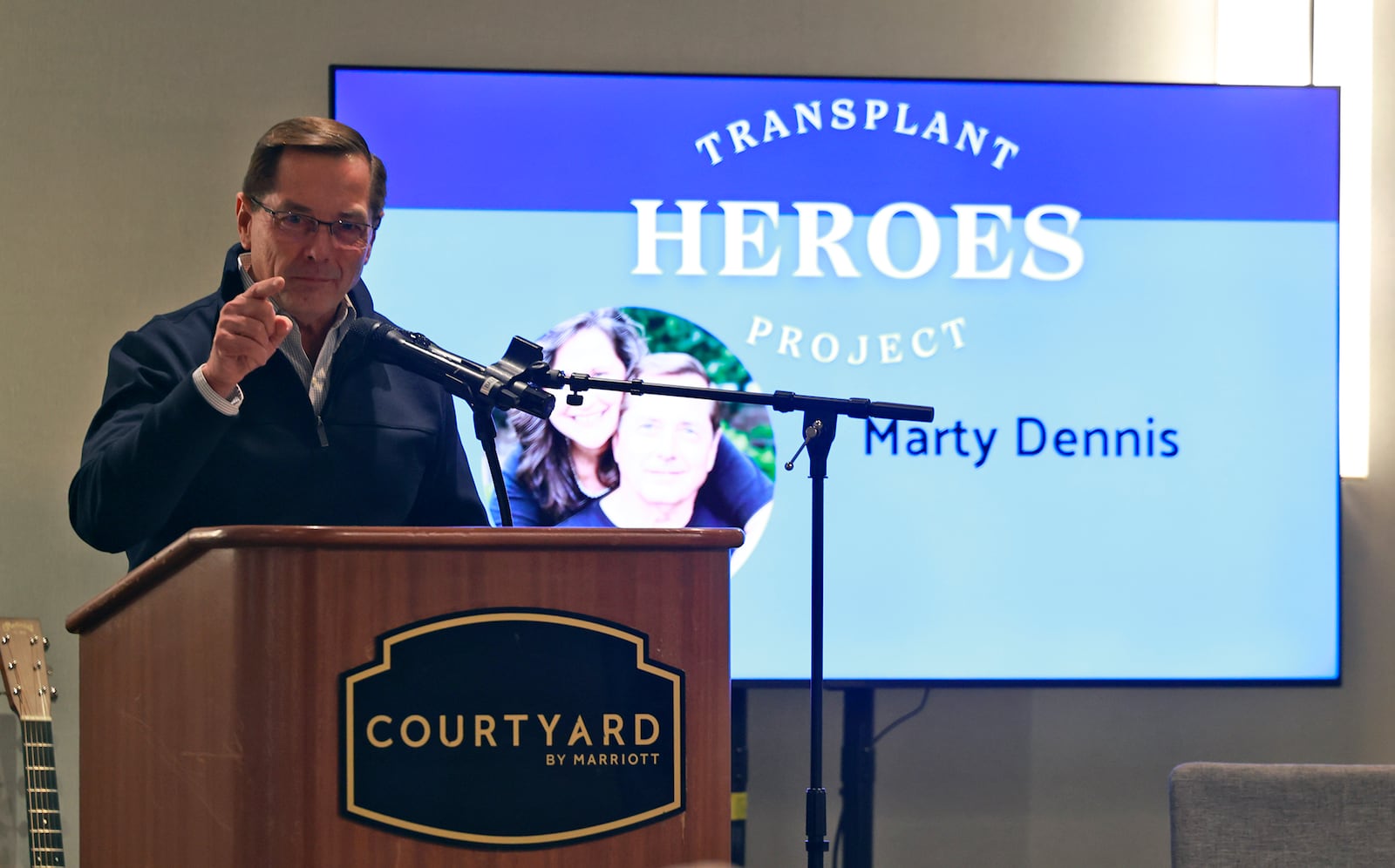 Marty Dennis speaks during the Mayor's Breakfast after being honored as a Transplant Hero Thursday, Nov. 21, 2024. BILL LACKEY/STAFF