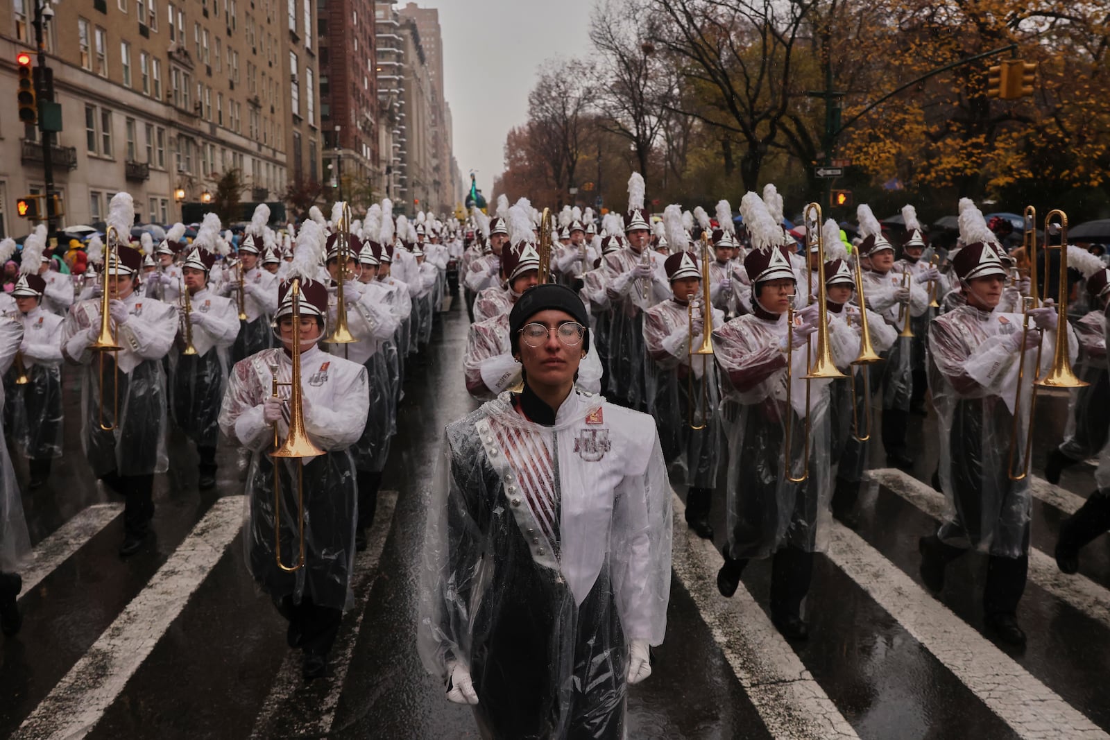 The University of Massachusetts Minutemen marching band marches down Central Park West while participating in the Macy's Thanksgiving Day Parade, Thursday, Nov. 28, 2024, in New York. (AP Photo/Yuki Iwamura)