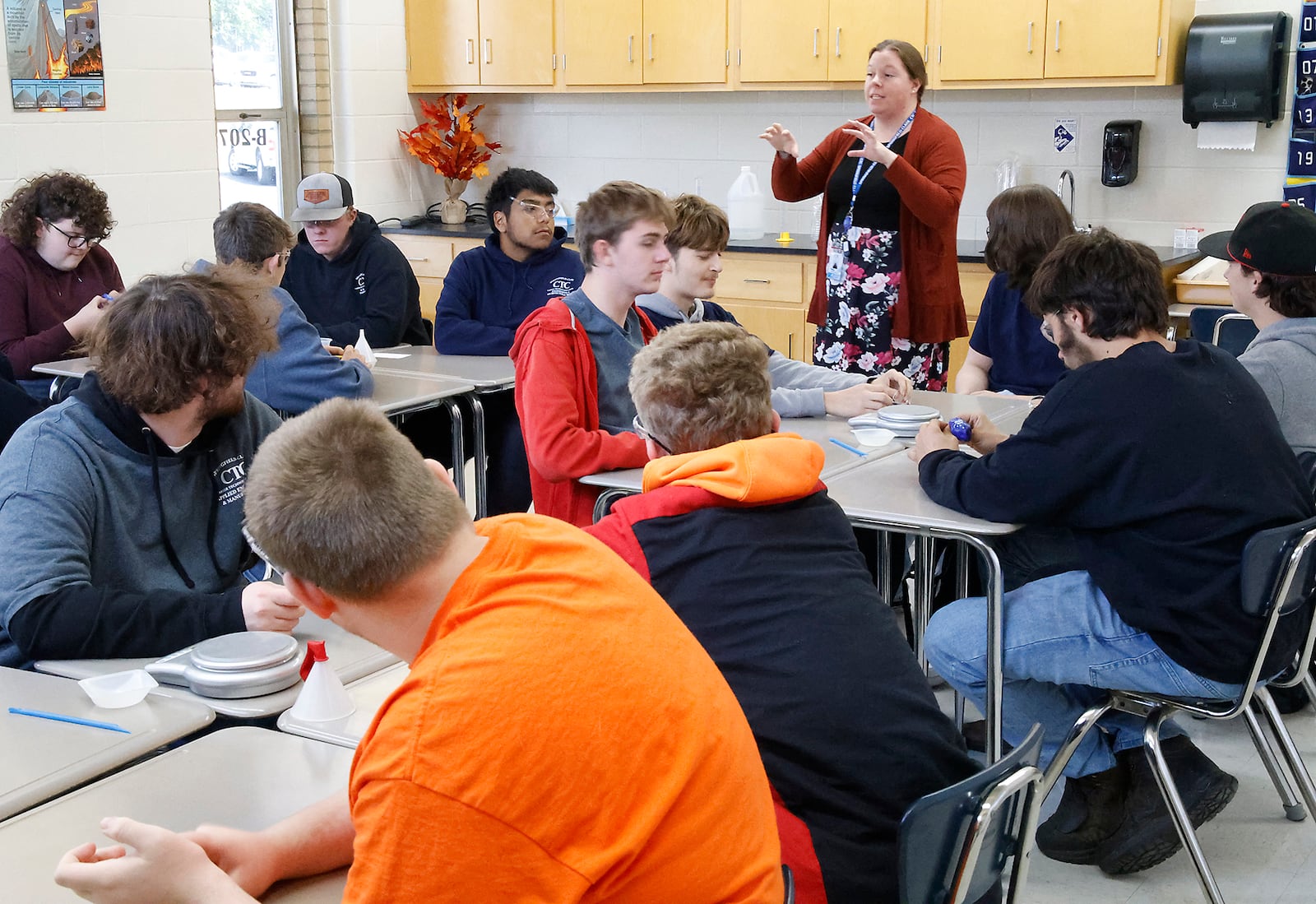 Jessica Meyer teaches a Matter & Energy Science class in a crowded classroom at the Springfield-Clark Career Technology Center.  BILL LACKEY/STAFF