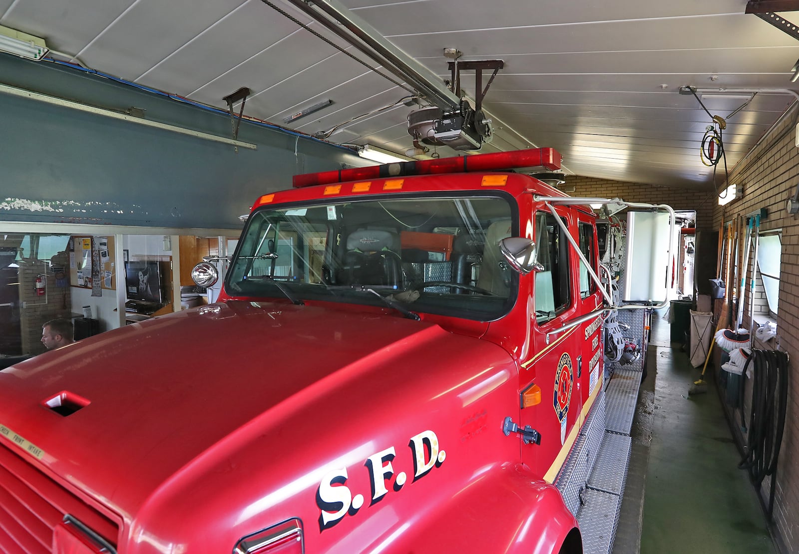 The Springfield Fire Division has to use an old fire engine at Station No. 3 because a new truck won't fit in the tiny garage bay. BILL LACKEY/STAFF