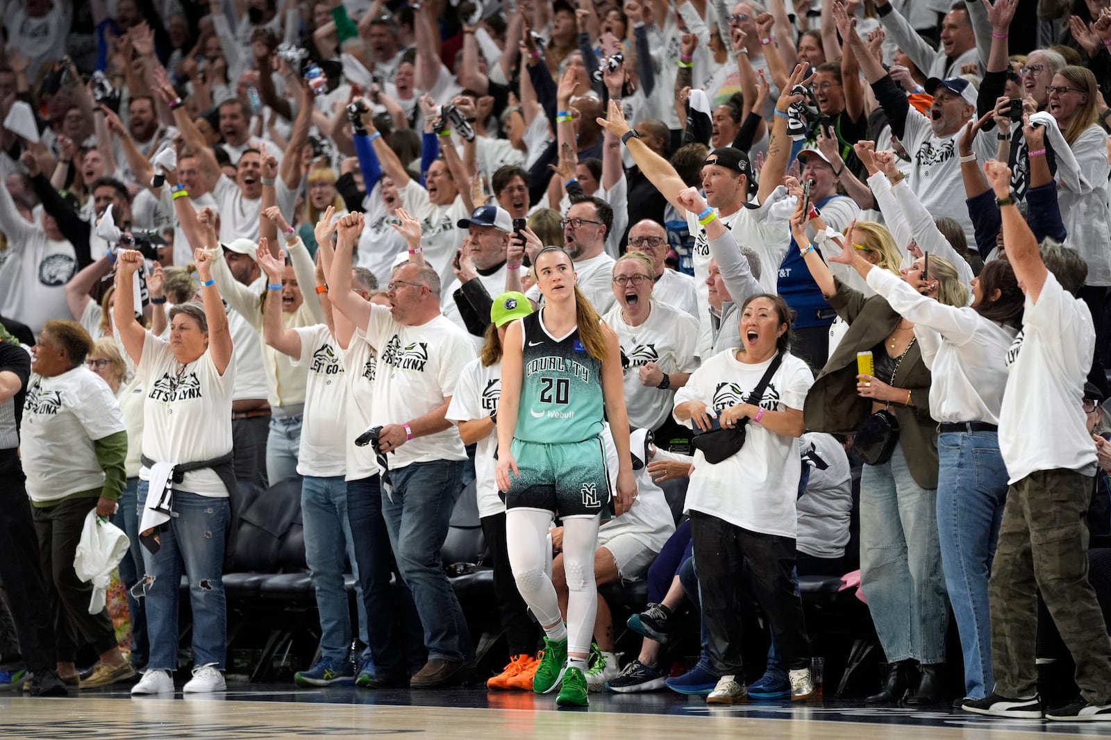 New York Liberty guard Sabrina Ionescu (20) reacts after missing a shot at the buzzer during the second half of Game 4 of a WNBA basketball final playoff series, Friday, Oct. 18, 2024, in Minneapolis. The Lynx won 82-80, forcing a Game 5 in the series. (AP Photo/Abbie Parr)